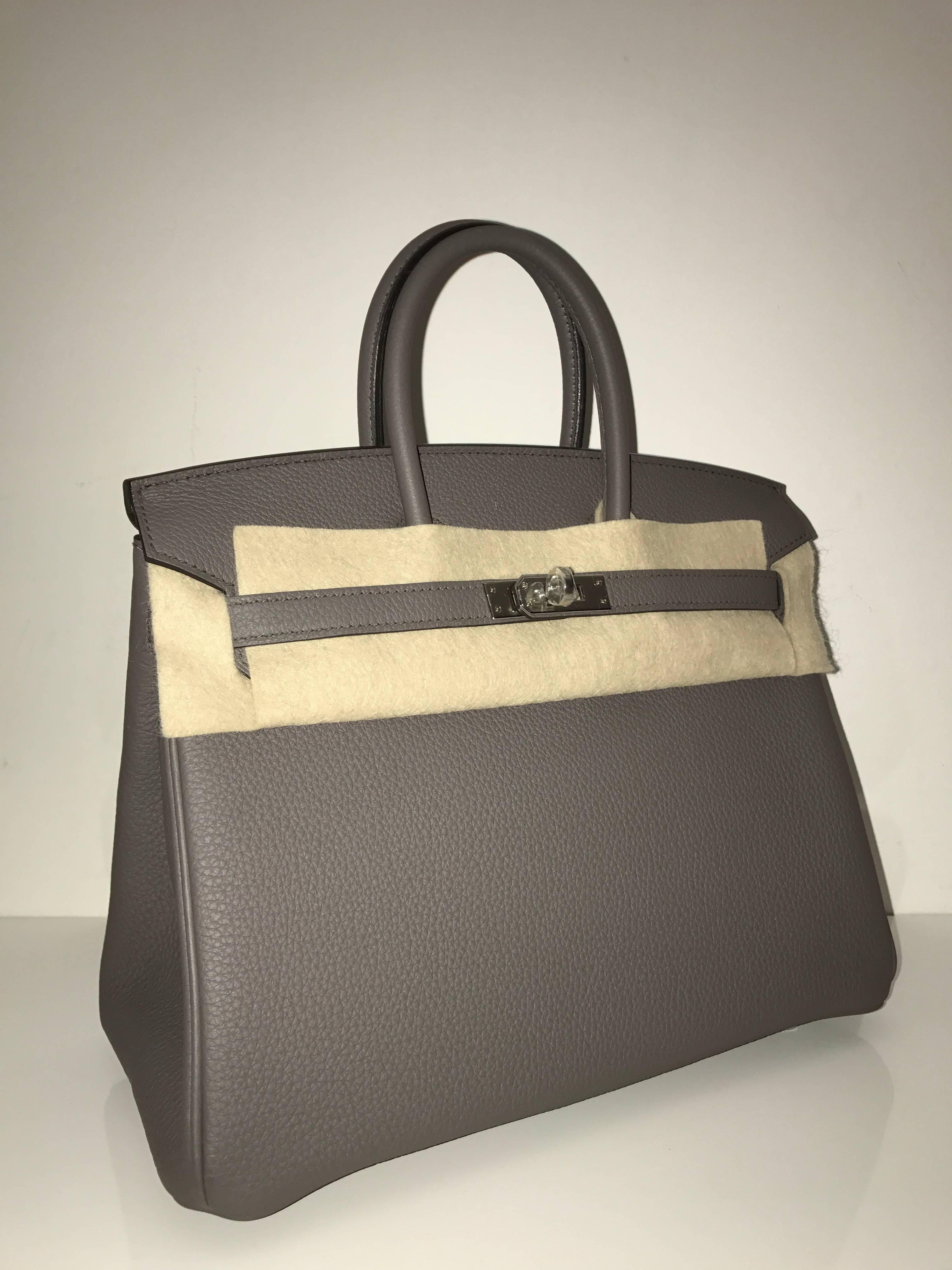 Hermes 
Birkin Size 25
Togo Leather 
Colour Etain 
Silver Hardware
Store fresh, comes with receipt and full set (dust bag, box...) 
Hydeparkfashion specializes in sourcing and delivering authentic luxury handbags, mainly Hermes, to clients around