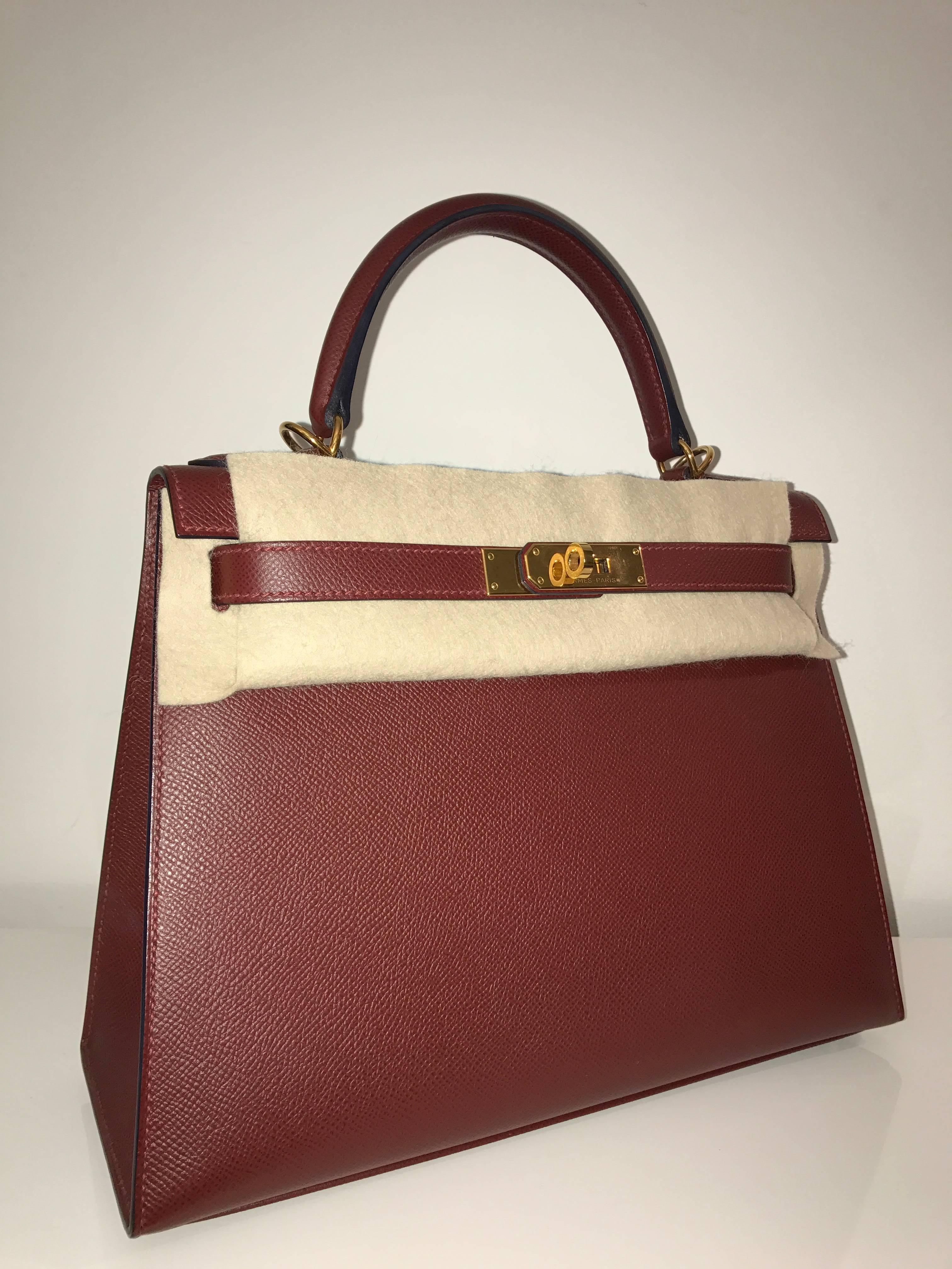 Hermes 
Kelly Size 28
Epsom Leather  
Colour Rouge H  
Gold Hardware
Store fresh, comes with receipt and full set (dust bag, box...) 
Hydeparkfashion specializes in sourcing and delivering authentic luxury handbags, mainly Hermes, to clients around