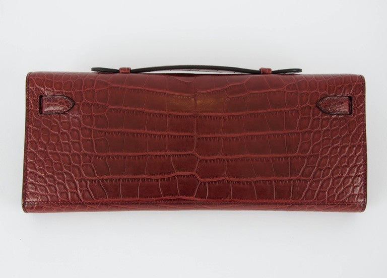 Rare HERMES Kelly Cut Matt Alligator Crocodile Bourgogne Permabrass T STAMP  2015
Store Fresh, comes with receipt and full set (box,...) 
HYDEPARKFASHION specialises in sourcing and delivering authentic luxury handbags, mainly Hermes to client