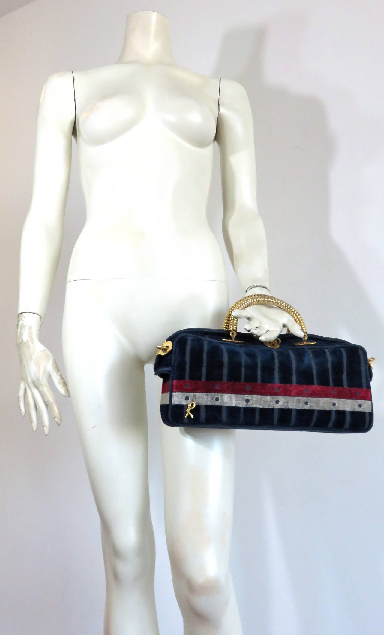 Adorable, 1960's ROBERTA DI CAMERINO Cut velvet long box handbag.

This great handbag features striped, dark midnight-blue, cut velvet base cloth with red and white, dotted stripe border.

Magnificent, golden-brass, metal coil top handles with