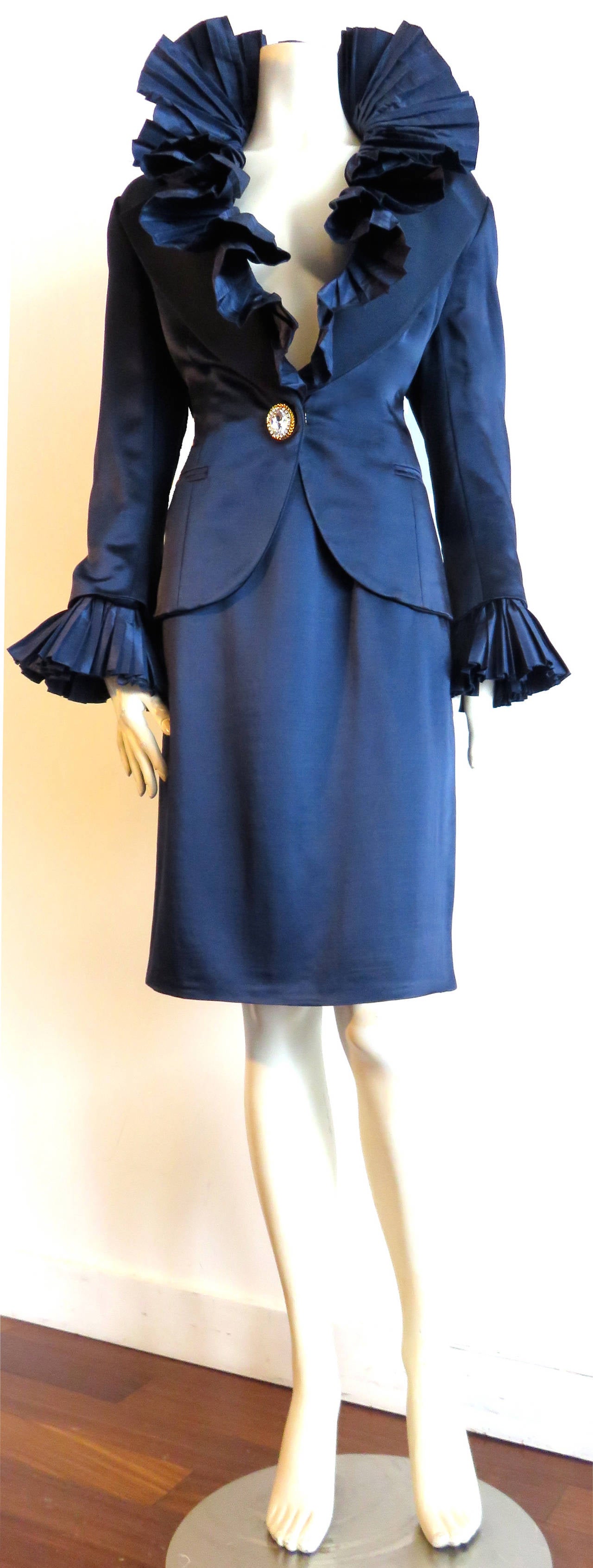 Amazing, CHRISTIAN DIOR by Gianfranco Ferré blue satin & taffeta skirt suit with dramatic, fan collar and cuff details.

Ultra-Lux, satin fabrication with a beautiful, silky sheen.  

Dramatic, accordion-pleated taffeta, collar and cuff detail. 