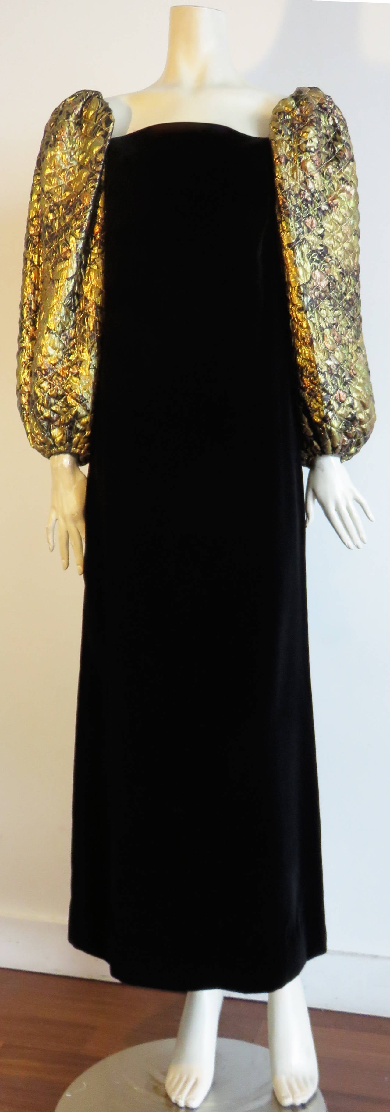 Worn once, 1980's PIERRE BALMAIN, black velvet evening dress with quilted brocade, 'balloon' sleeves.

This luxurious evening dress was originally purchased at El Cote Inglez in Madrid, Spain, and is numbered, as labeled.

This stunning evening