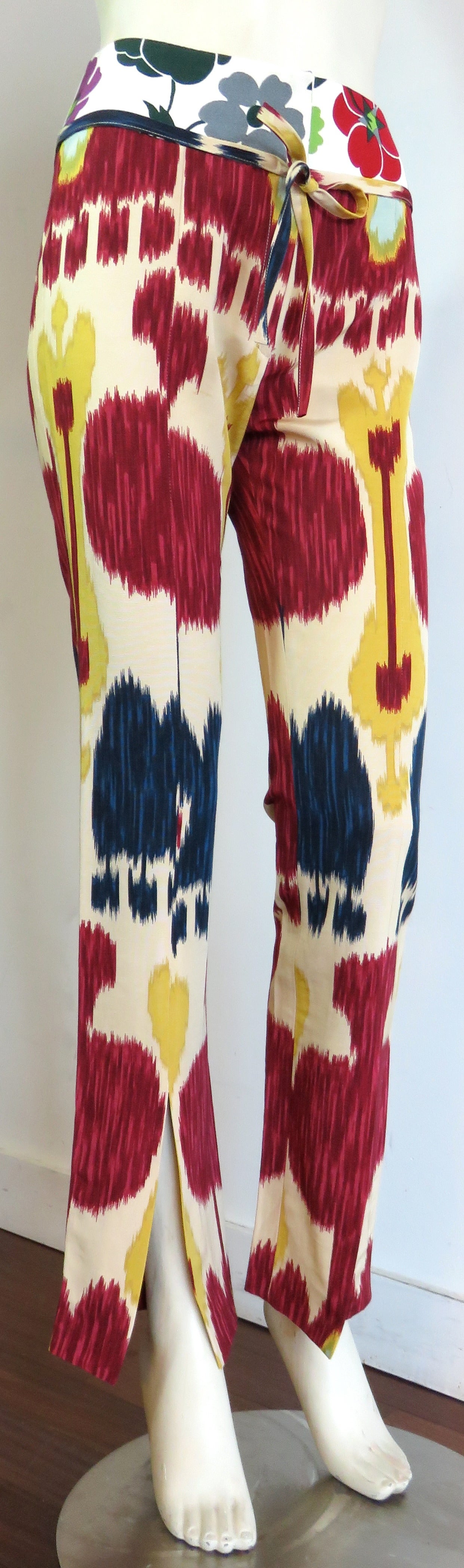 Excellent condition, 2001 CHRISTIAN DIOR by JOHN GALLIANO Ikat trousers pants.

From John Galliano's high octane, Fall 2001 Dior collection inspired by a diverse fusion of ethnic ravers, hip-hop divas, and irish gypsies.

Bold, Ikat printed