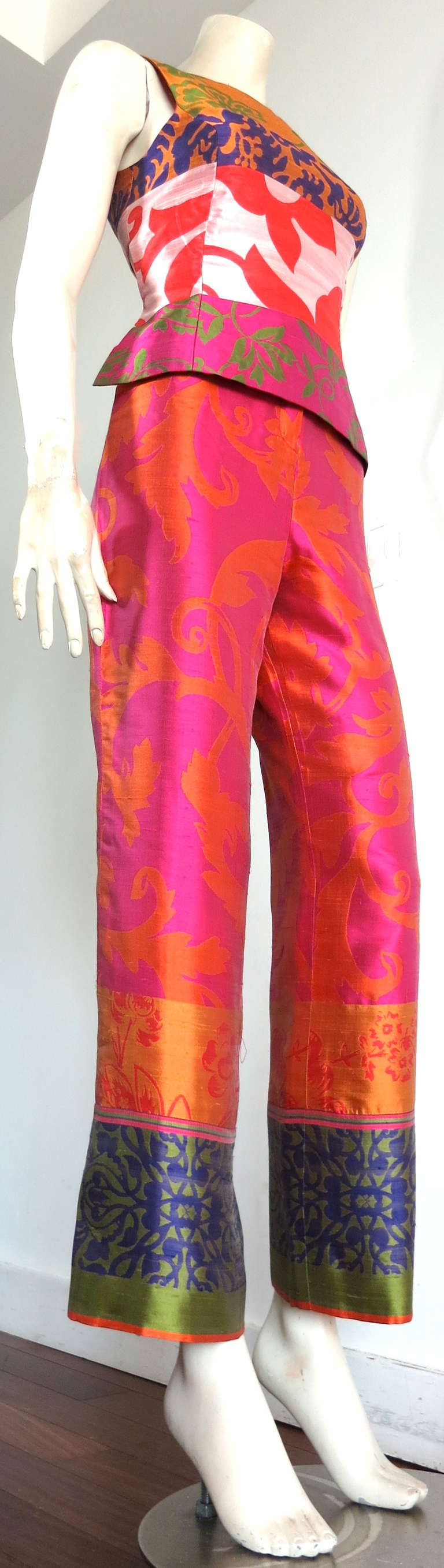 OSCAR DE LA RENTA Two-peice silk tapestry bodice & pant set.

This stunning set was designed by Oscar de La Renta for Spring 2001.

The tapestry-style woven silk fabrication features multi-pattern bands in a variety of rich colors.  The fabric