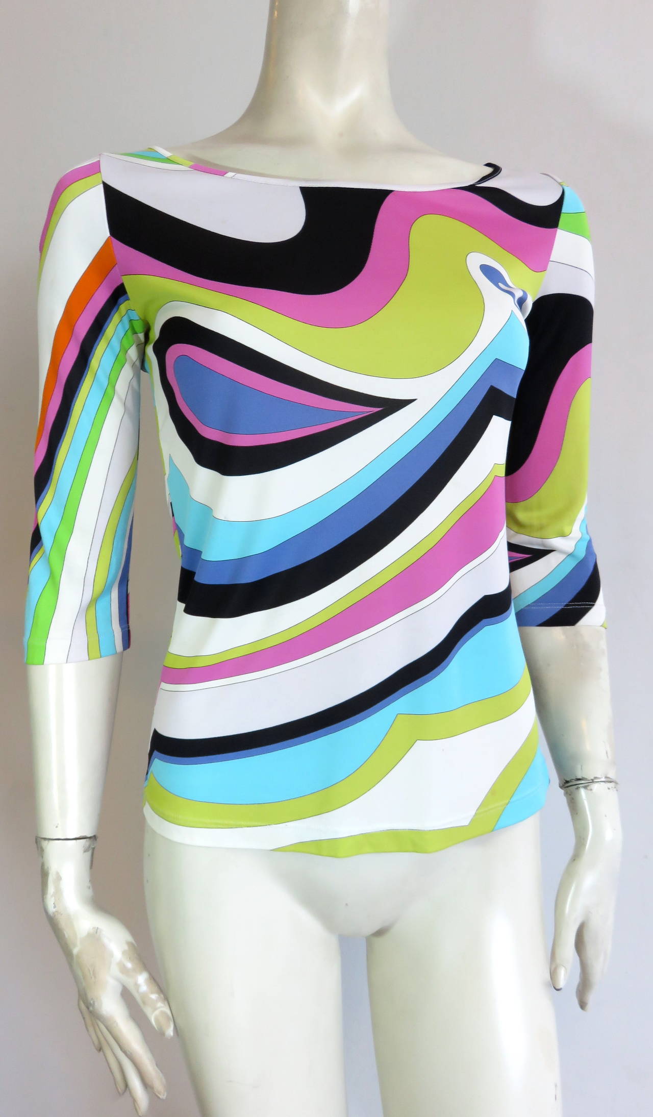 EMILIO PUCCI, rainbow swirl print stretchy top.

Signed artwork print.

Scooped neckline opening with 3/4-length sleeves.

Made in Italy, as labeled.

*MEASUREMENTS*

The inside size/content label was removed.  The top suits a US size