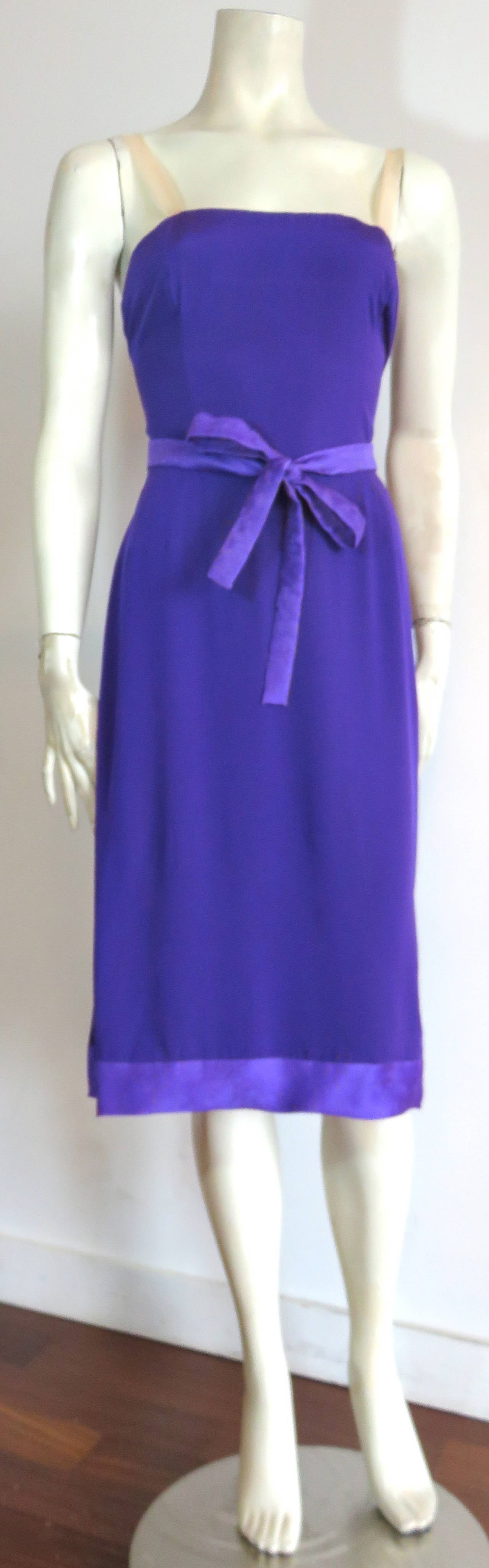 Excellent condition, 1960's BALENCIAGA, haute-couture, purple silk slip dress with floral jacquard trim.

Simple silk, slip dress style with floral jacquard waist sash, and bottom hem, contrast panel.

The shoulder straps are made of sheer,