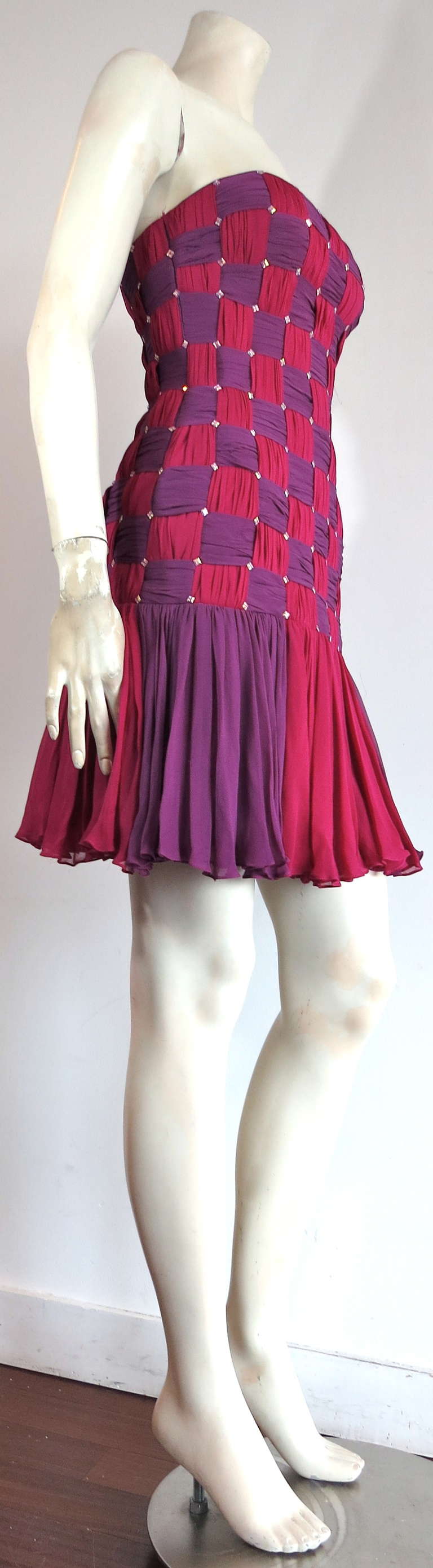 Excellent condition MICHAEL CASEY silk basket weave cocktail dress.

This amazing dress was designed by Michael Casey during the 1980's in the USA.

100% Silk chiffon, basket woven torso with flared hem.

Intersections of the basket weave