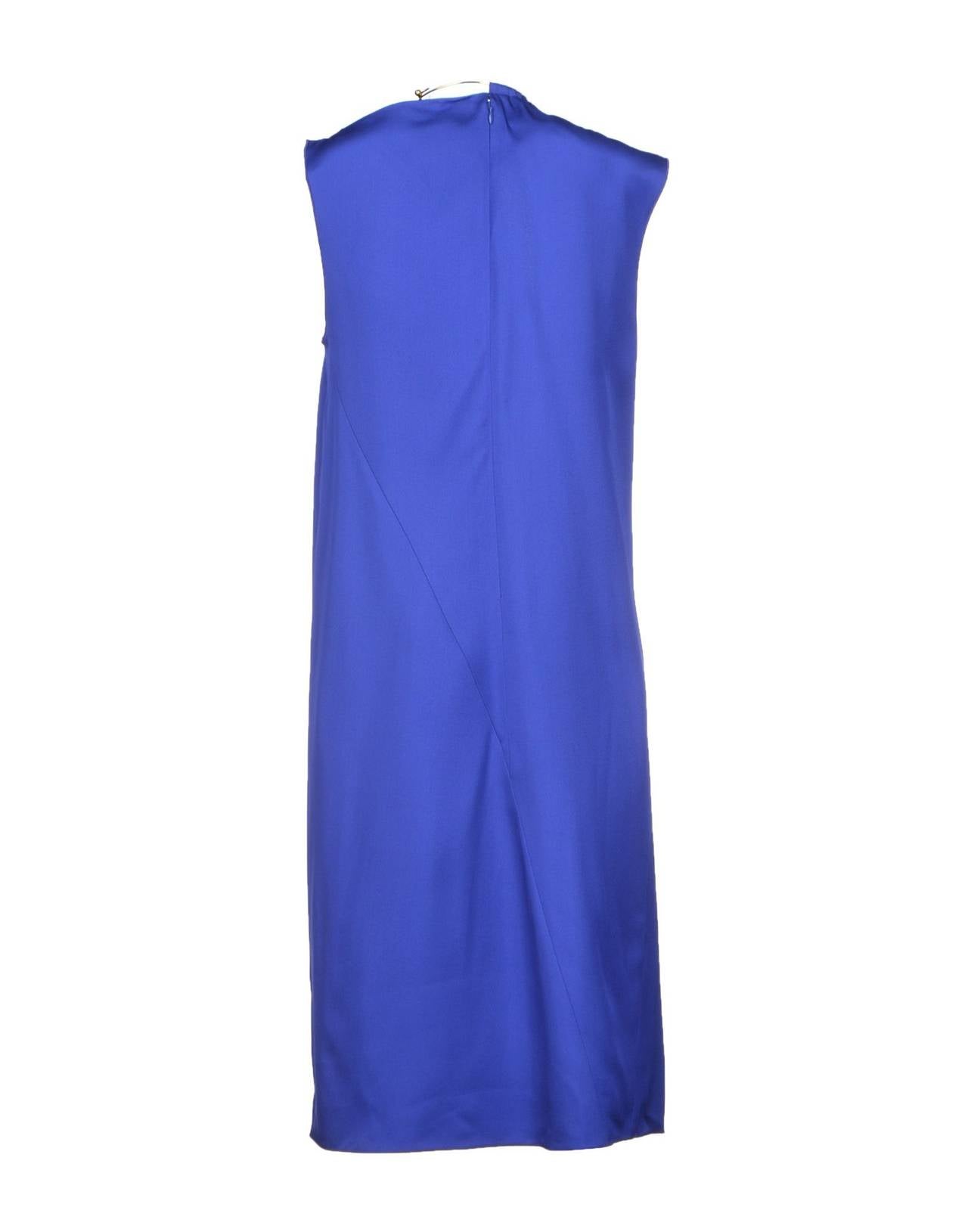 Excellent condition, CELINE by Phoebe Philo, contemporary, cerulean blue, shift dress with locking, metal wire-necklace hardware.

'V'-shaped, cut-out design at wearer's right front neck, and left side neck.

Angled seam construction with