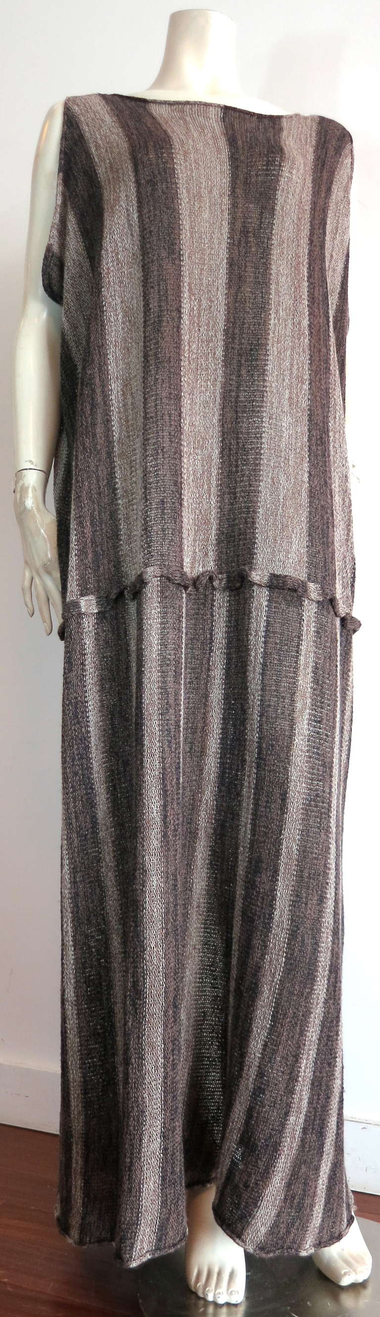 Vintage ISSEY MIYAKE Linen sweater knit dress.

This stunning dress was designed by Issey Miyake during the 1980's in Japan.

The dress features an airy, linen & nylon sweater knit fabrication perfect for Spring/Summer.  Gradient style vertical