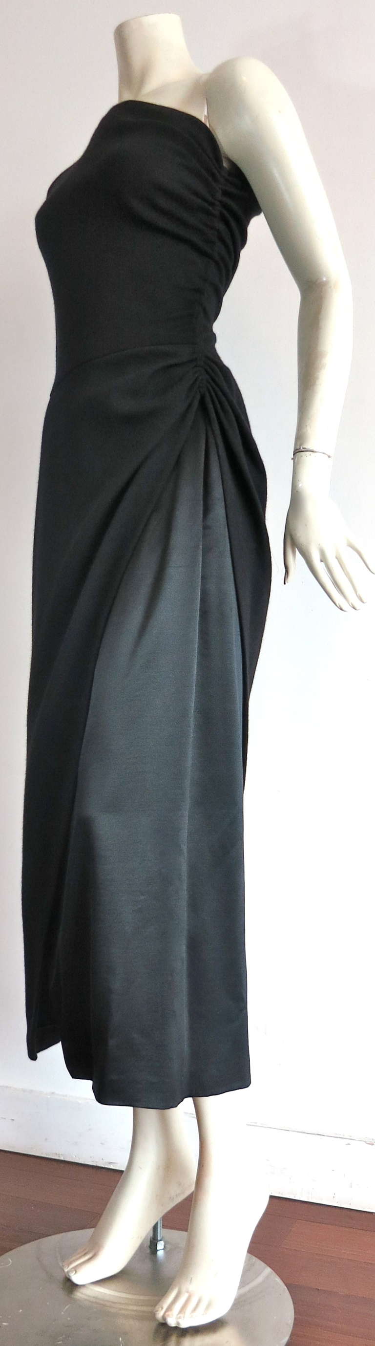 Vintage GEOFFREY BEENE One shoulder jersey & satin dress.

This gorgeous evening dress was designed by Geoffrey Beene during the late 1970's in New York City.  Literary provenance provided on request.

Modern one shoulder silhouette with