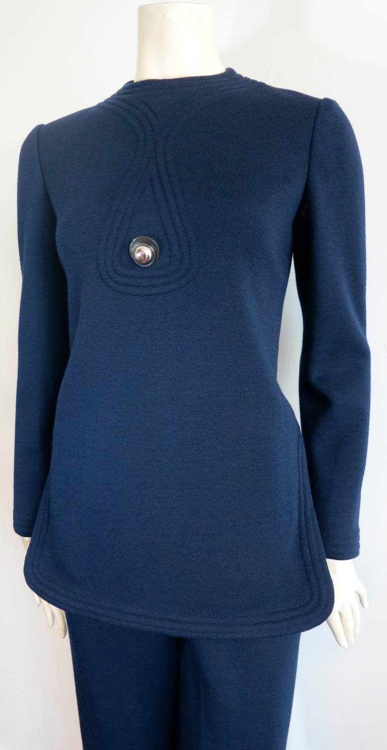 Amazing PIERRE CARDIN 'Space Age' 2pc. pant set.

This great tunic set was designed by Pierre Cardin during the 1960's in France.

The set is made of dark navy blue, wool knit jersey, and features triple corded style quilting around the neck,