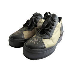 1980
s CHANEL Gold
black leather trainers Vintage 1980
s CHANEL Gold
black leather trainers