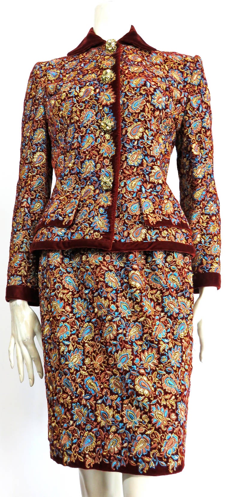 Gorgeous, 1980's OSCAR DE LA RENTA all-over, embroidered velvet evening skirt suit.

This all-over embroidered skirt suit was designed by Oscar de la Renta during the 1980's in New York, and is made in the USA, as labeled.

The base fabric is a