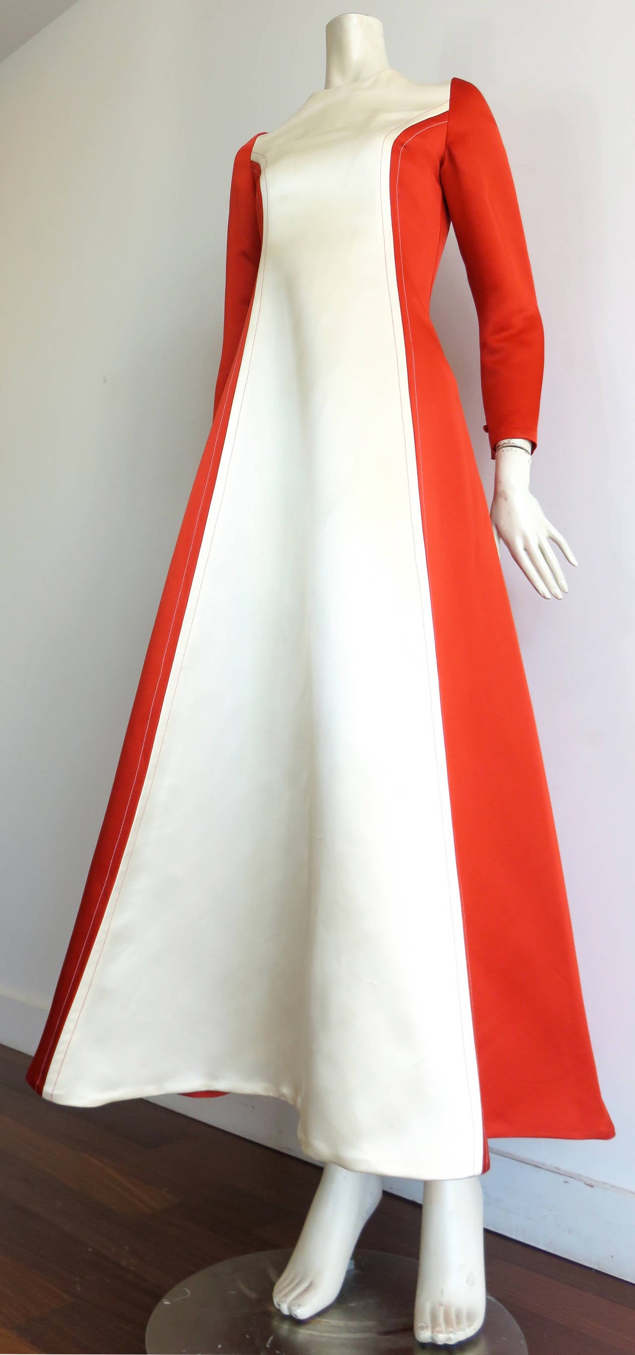 Absolutely stunning, BILL BLASS 1970's Duchess silk satin gown. 

This incredible gown was designed by Bill Blass during the early 1970's in New York, and is in excellent condition.

The base fabric is a thick, duchess satin that is incredible