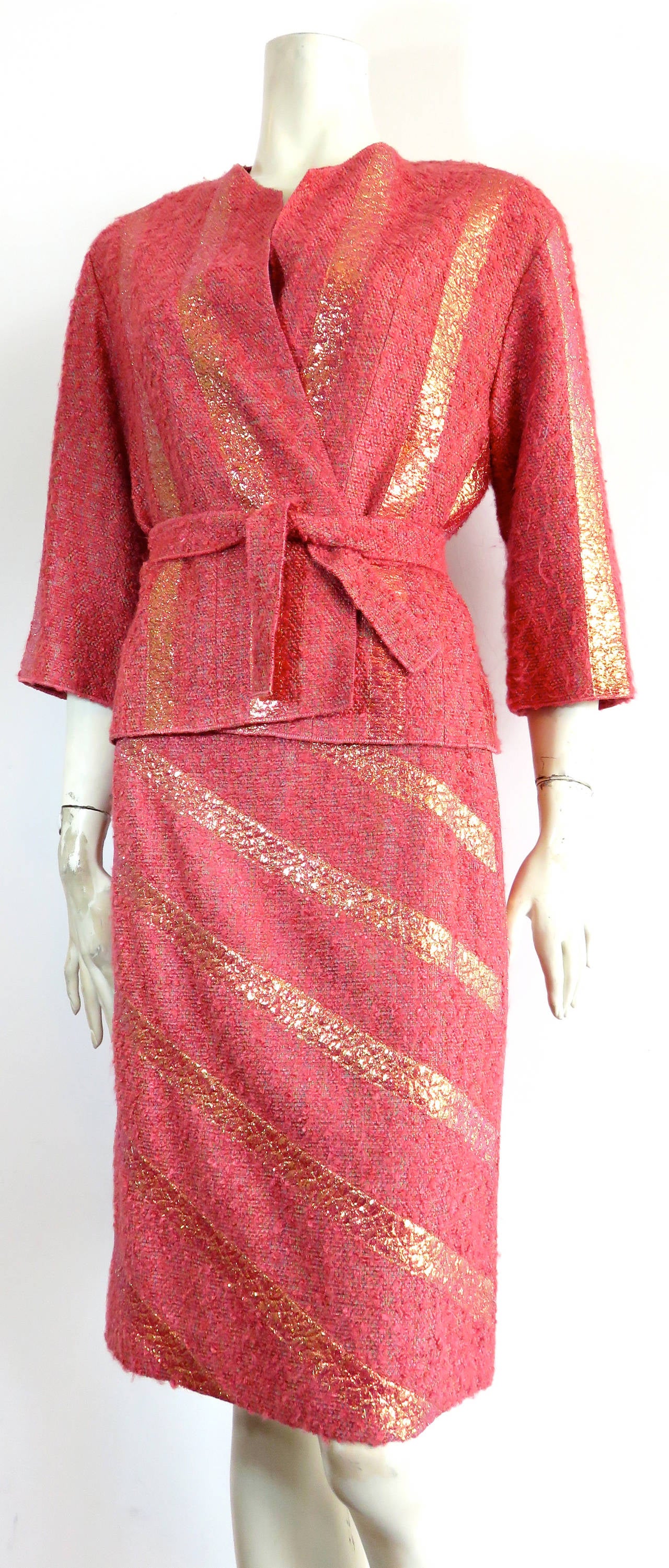 Like new, CHANEL PARIS coral shine stripe bouclé 2pc. skirt suit with gorgeous, 'cellophane' style stripes.

The skirt suit was worn once, and is in like new condition with absolutely no signs of wear of damages.

This beautiful skirt suit