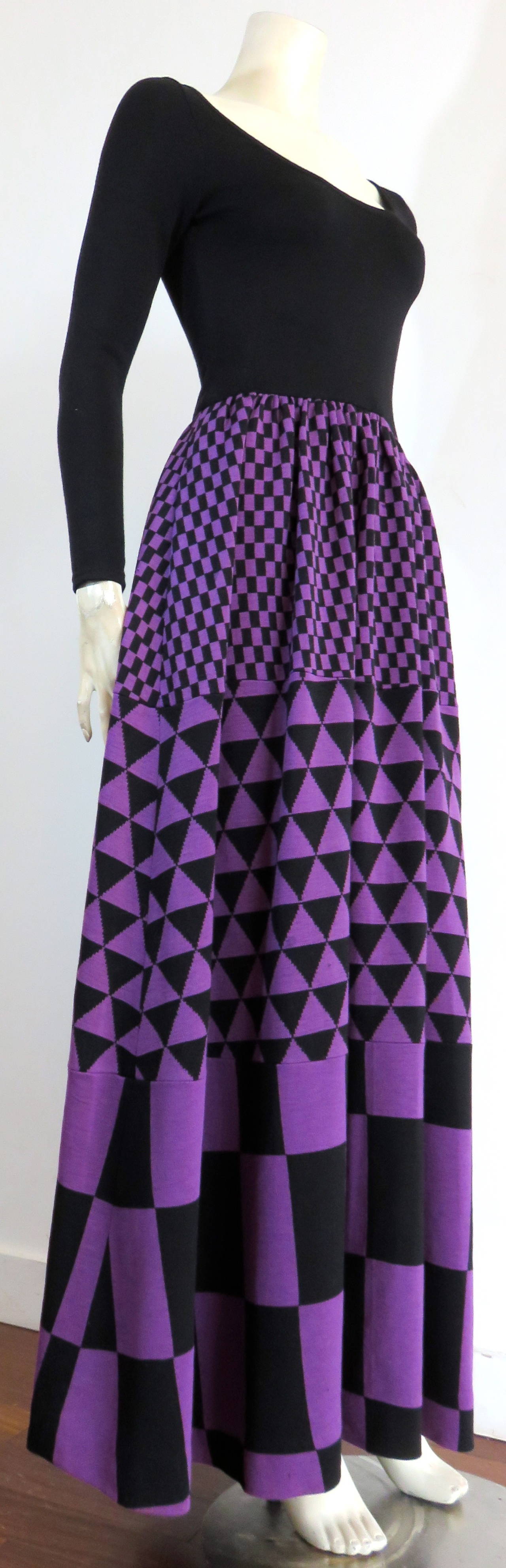 1970's RUDI GERNREICH Knit wool geometric panel dress

This fabulous dress was designed by Rudi Gernreich during the 1970's in the USA, for Harmon Knits.

The dress features a solid, black, top bodice with scooped neckline, and long sleeves. 