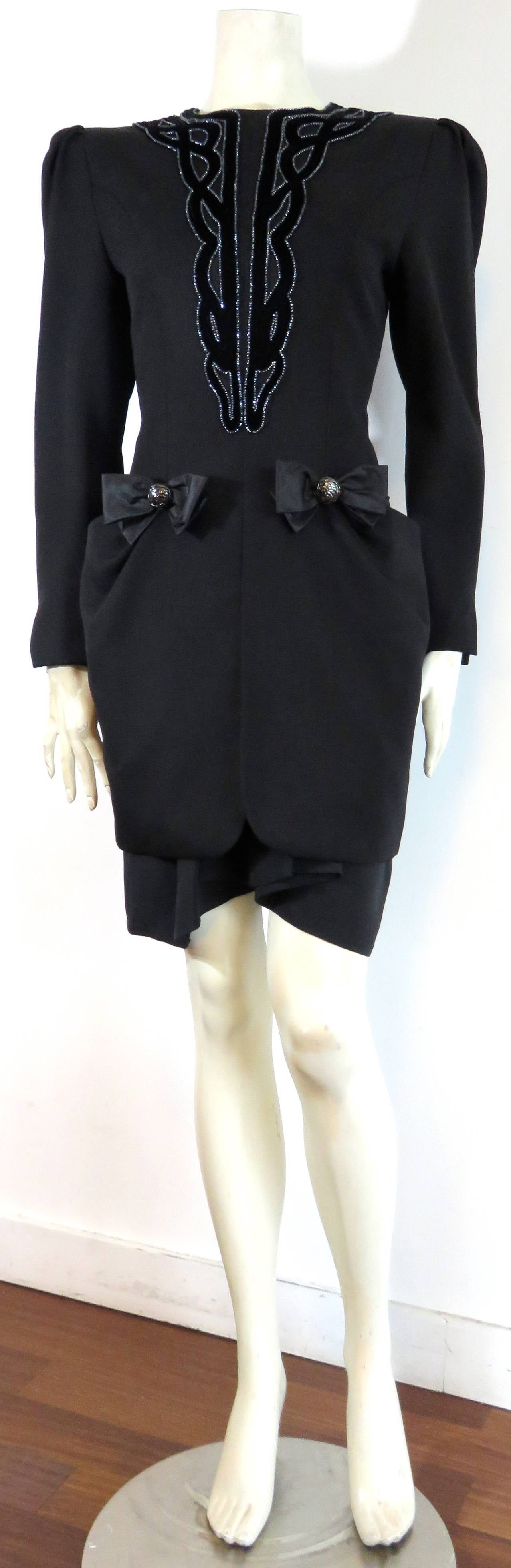 Excellent condition, 1980's NINA RICCI 2pc., black cocktail dress with velvet appliqué & beading details.

The main, over-dress features a gorgeous, Nouveau-style, velvet, appliqué at the front chest, and around the neckline with sparkling,