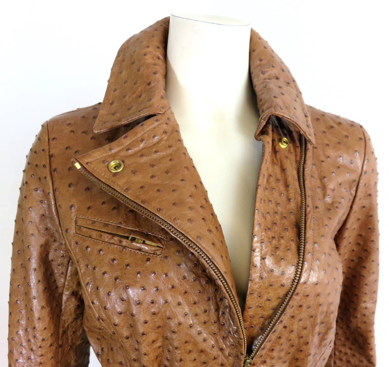 Worn only once, 1980's HERMES PARIS Cognac ostrich 'full-quill' leather jacket & pant set.

This amazing jacket & pant set is completely made of luxurious, 'full-quill', ostrich leather in a rich, cognac color.  

This luxurious,