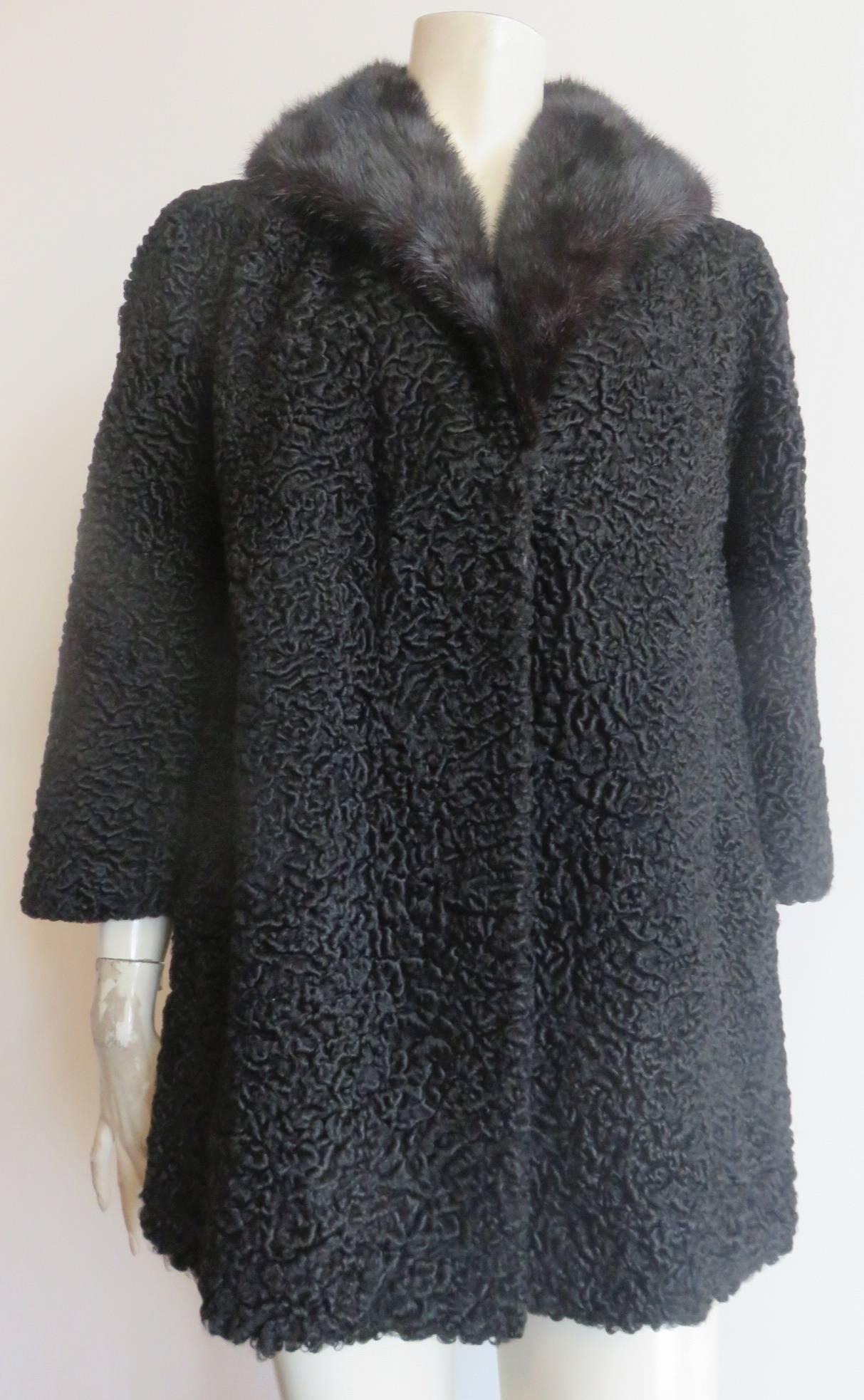 Mint/never worn condition, 1960's, MAX BOGEN Genuine, black, persian lamb & mink fur coat.

Polished, mink fur, shawl collar with lush, black, persian lamb fur shell.

Concealed, side waist pockets with moleskin pocket bag lining.

Concealed,