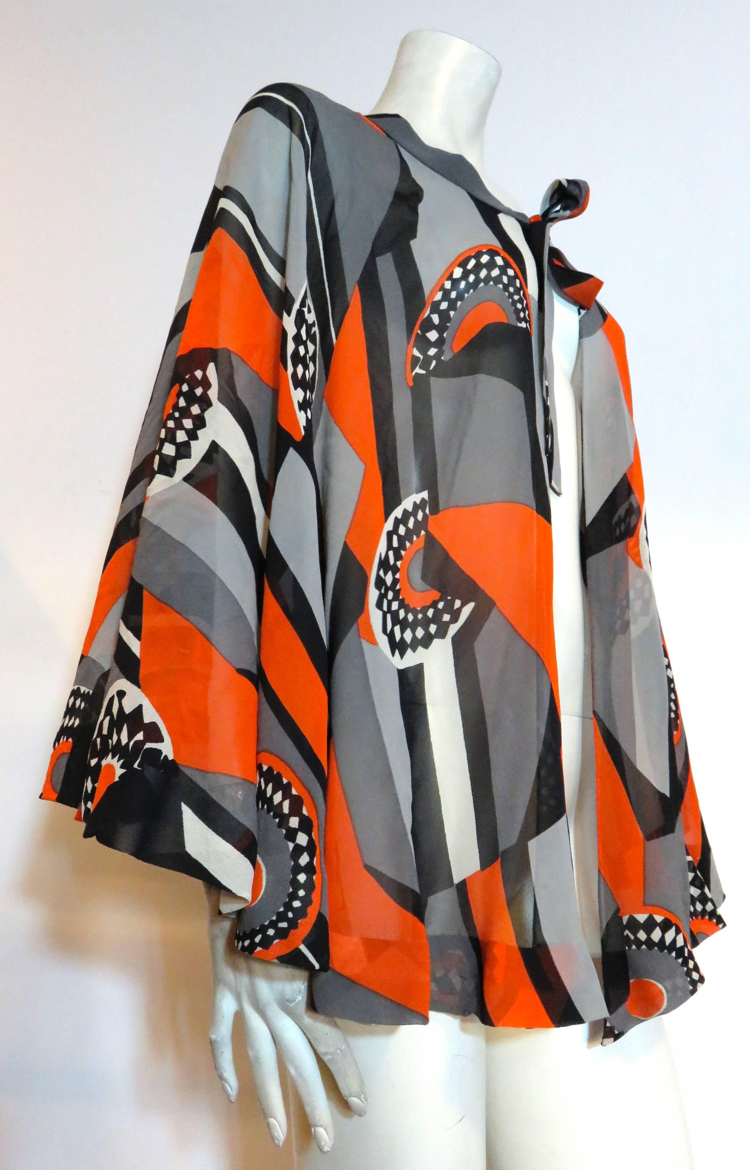 Black 1970's LA MENDOLA Deco-printed silk cape For Sale