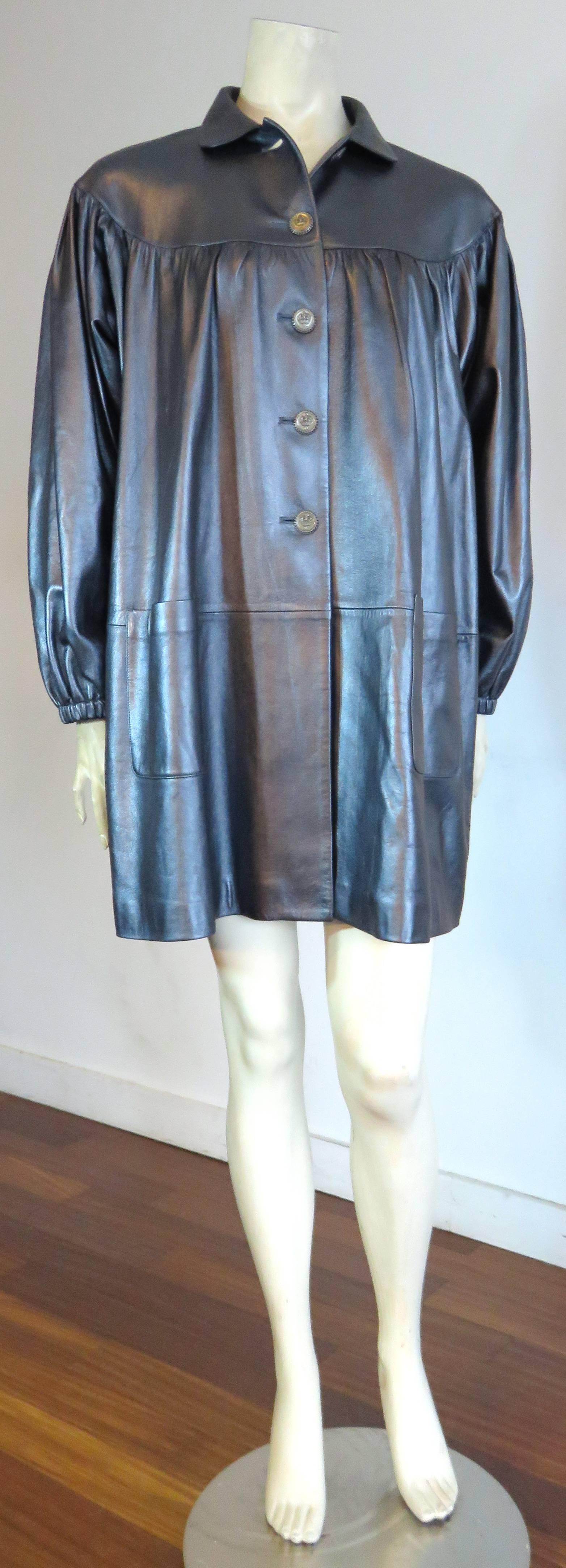 Worn once, and in 'like new' condition, CHANEL PARIS Pewter-finished, lambskin, leather coat.

Ultra-soft, and supple, lambskin leather fabrication featuring shimmering, pewter top finish.

Crown logo engraved buttons at front.

This fabulous