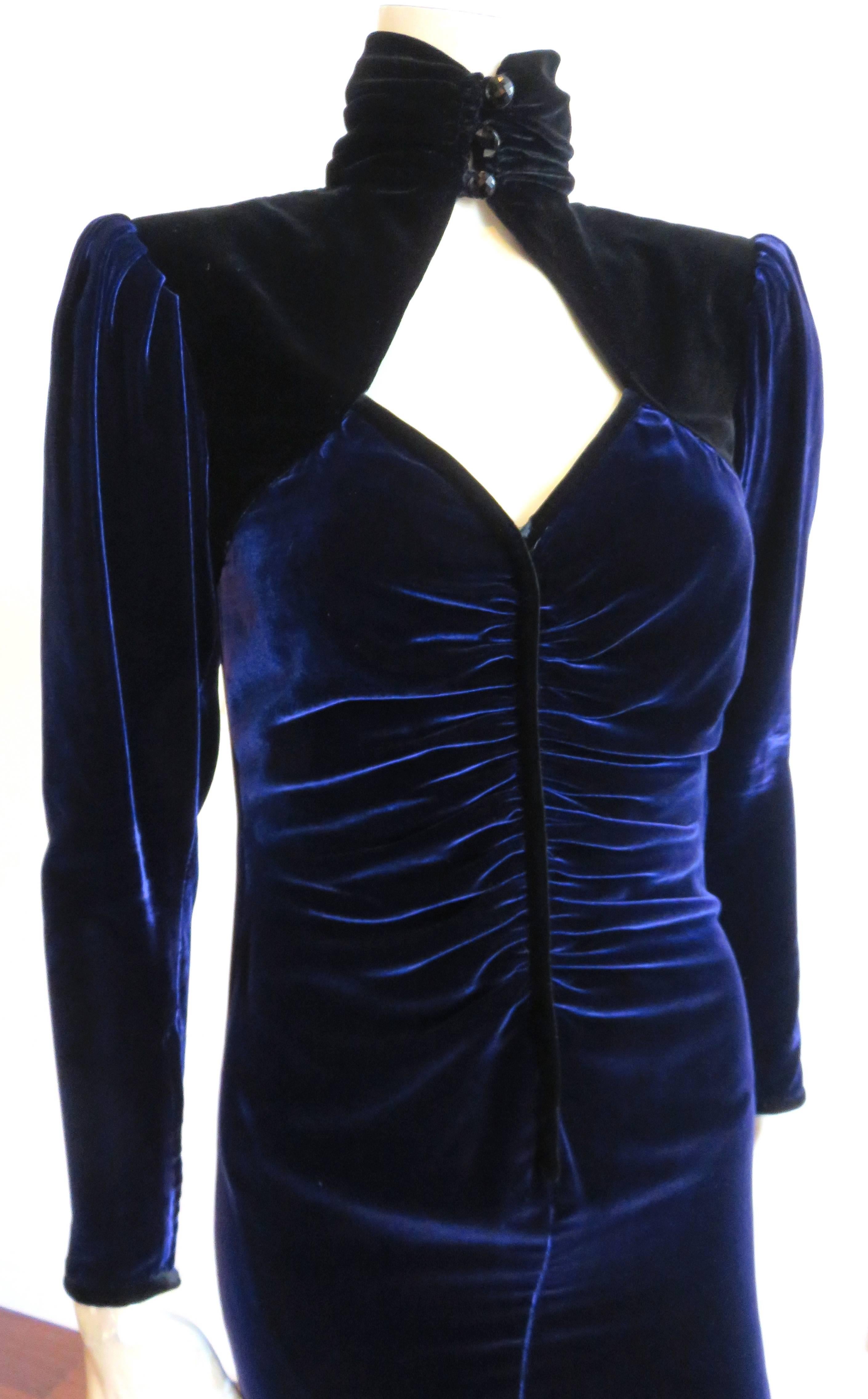 1980's UNGARO PARIS, dark midnight blue velvet cocktail dress.

Ultra-soft, silk velvet fabrication in dark, midnight blue body, and black velvet neck, top chest panels.

Sexy, diamond-shaped neck design with ruché front seam line.

Gathered