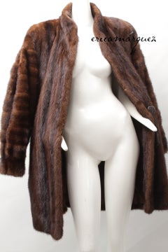 YVES SAINT LAURENT, Cappotto vintage in pelliccia di visone con chiusura singola in pelle e frange