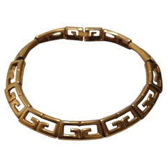 Collier ras-du-cou Givenchy vintage des années 1980, motif GG doré