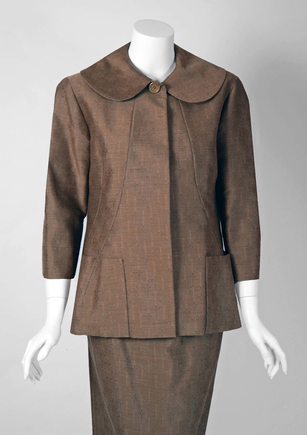 Spectacular Pierre Cardin haute-couture designer ensemble in the prettiest toffee color silk-wool. In 1951 Cardin opened his own couture house and by 1957, he started a ready-to-wear line; a bold move for a French couturier at the time.  This