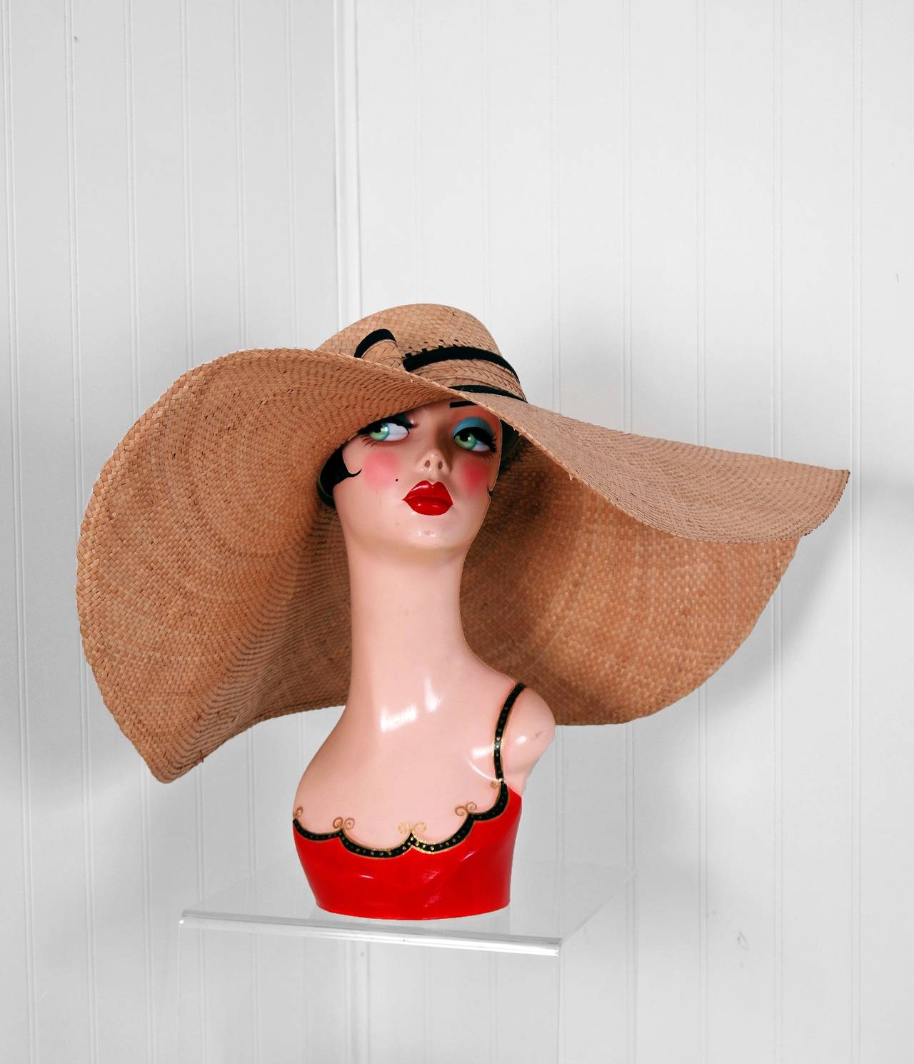 Sensational 1960's woven-straw wide brim hat for the lady who wants all eyes on her! I adore the side-bow which is trimmed with black cotton. An unforgettable fashion statement that is hard to come by! Excellent condition.
Measurements;
Interior