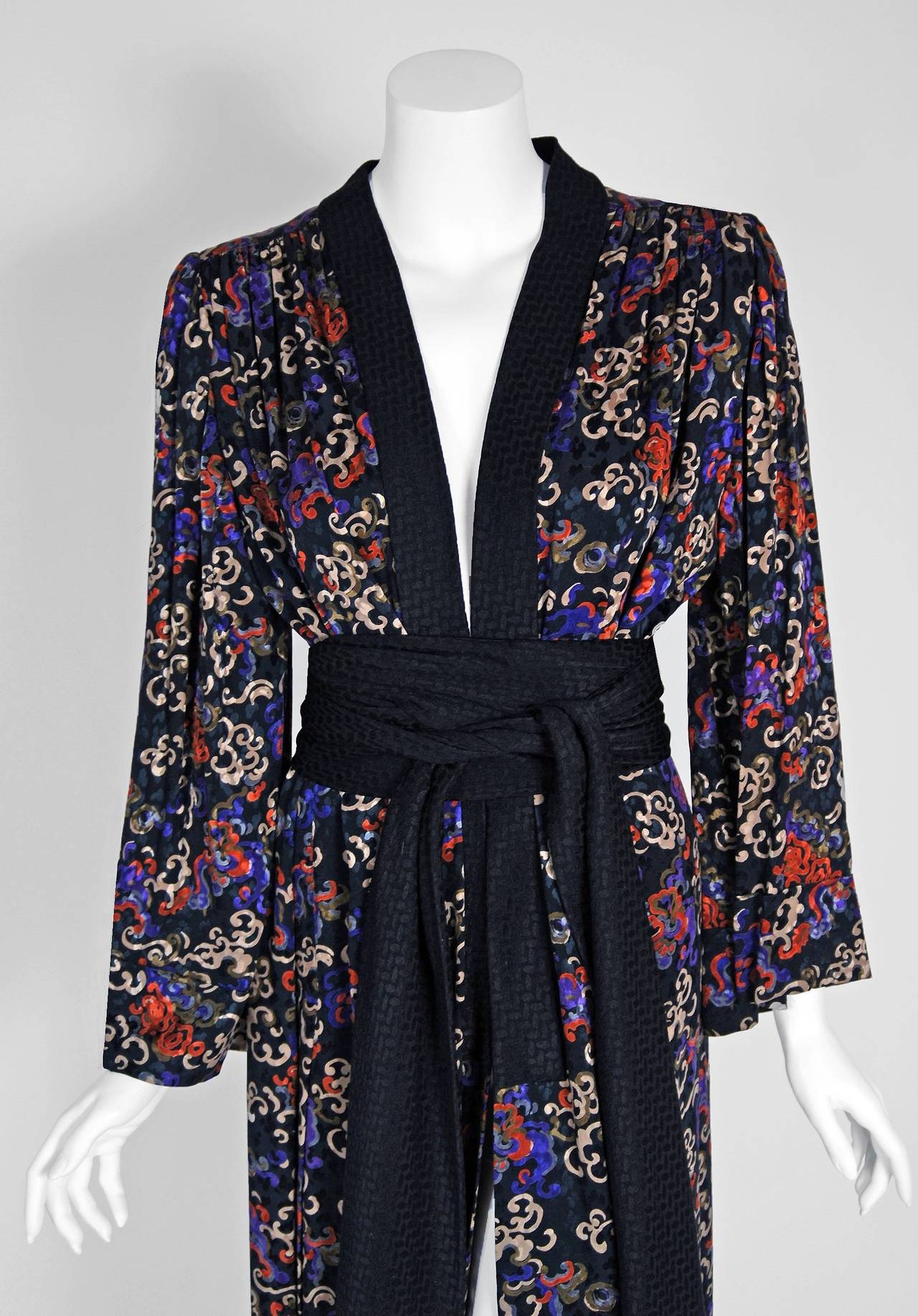 Breathtaking Yves Saint Laurent Haute-Couture belted kimono jacket fashioned in a the most beautiful colorful art-nouveau patterned silk. Such a rarity to find both pieces together! It is insanely sexy with its simple wrapped cut paneled high slit