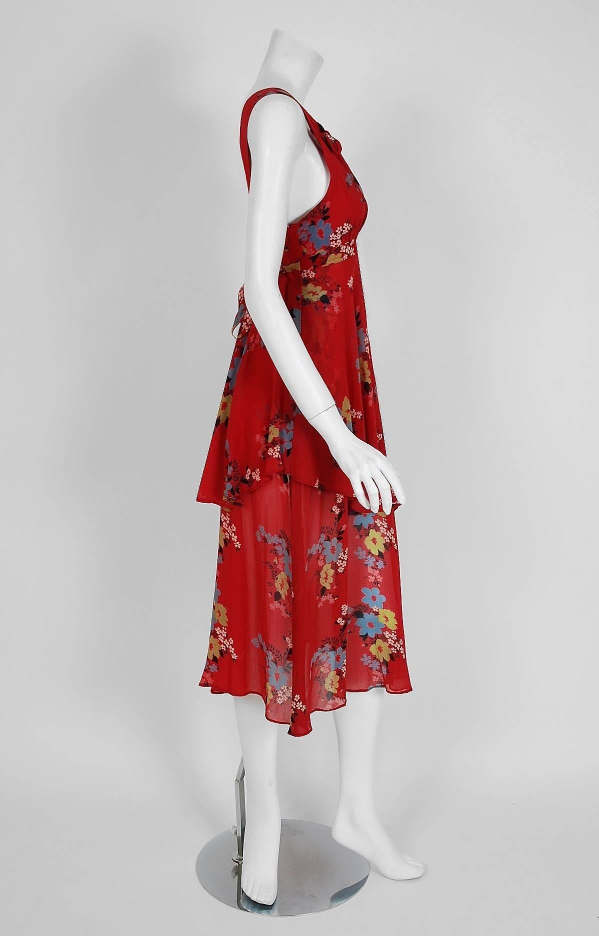 A charming raspberry-red floral crepe Ossie Clark for Radley dress that is both timeless and chic! Radley was a British clothing manufacturing company of the 1960's through the early 1980's. The main designer for the company, Raymond 