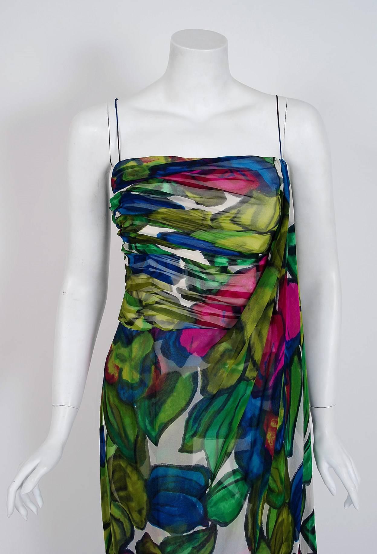 A breathtaking gown by the famous American designer, Will Steinman. The vibrant large-scale watercolor floral print used in this garment has a fresh modern vibe that I find irresistible. The bodice is a seductive thin-strap plunge with flattering