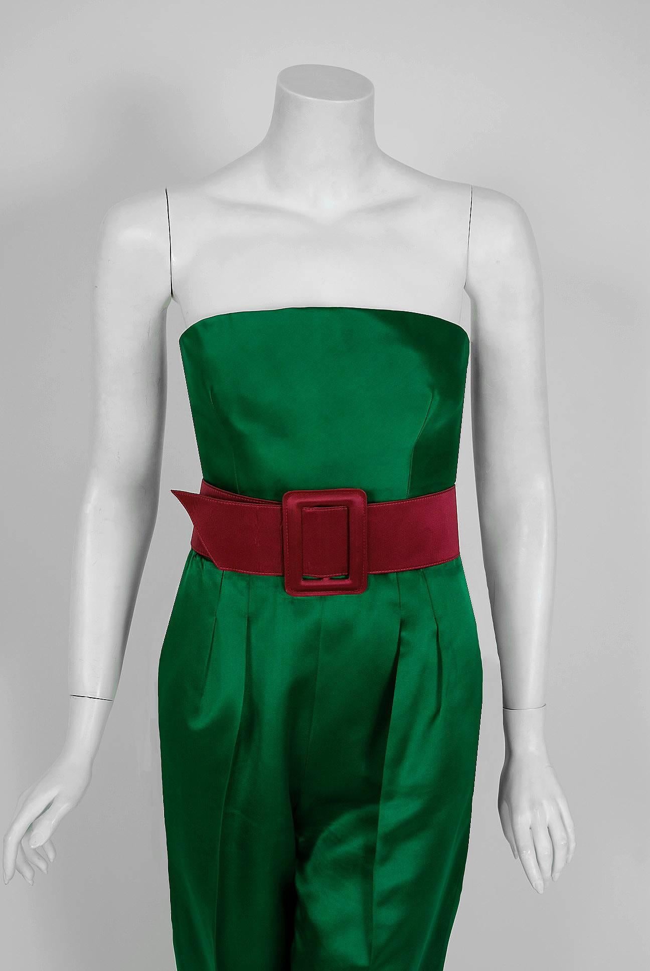 Givenchy, the name itself evokes glamour, refined elegance, simplicity and style. Givenchy's trademark of sculpted lines and luxurious fabrics make his work easily recognizable. This bold jumpsuit ensemble, dating back to their 1991 fall/winter