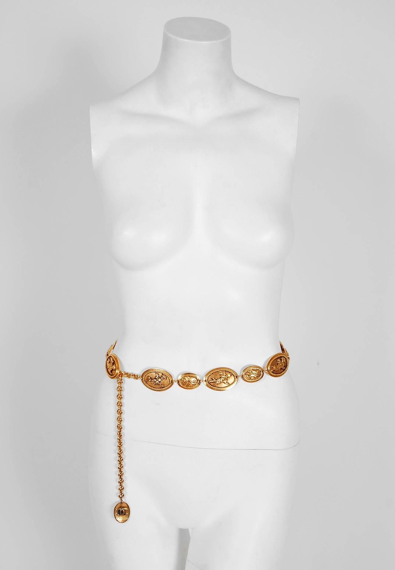 Chanel is known to be one of the most luxurious and decadent fashion houses in the world. This breathtaking gold-toned chain link belt is a perfect example of why this couture brand has stood the test of time. I adore the over-sized cherub angels