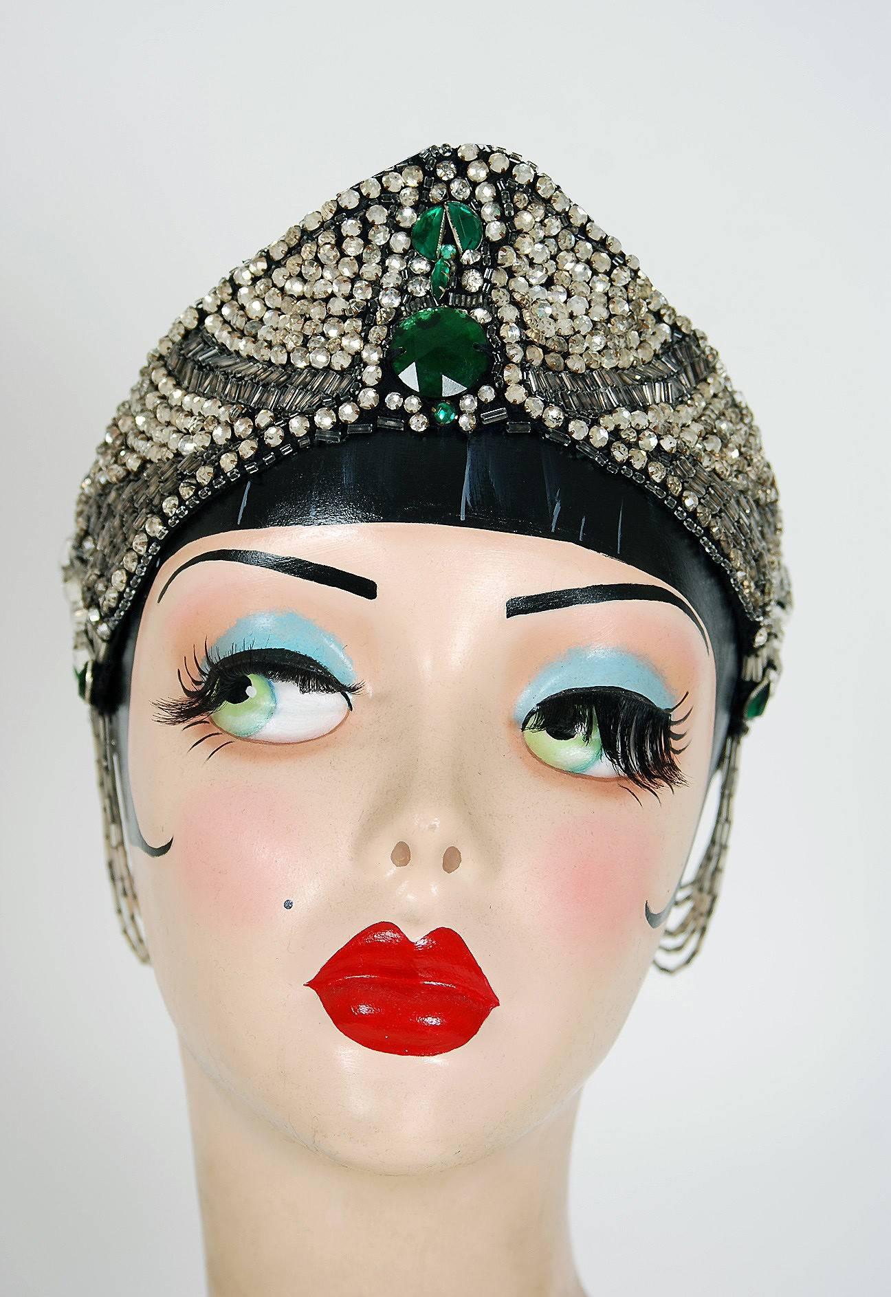 Breathtaking 1920's French couture emerald-green and clear jeweled flapper evening headpiece. This is, without a doubt, one of the most extraordinary antique crowns I have ever laid eyes on. Prong-set rhinestones and tube glass-beads with tons of