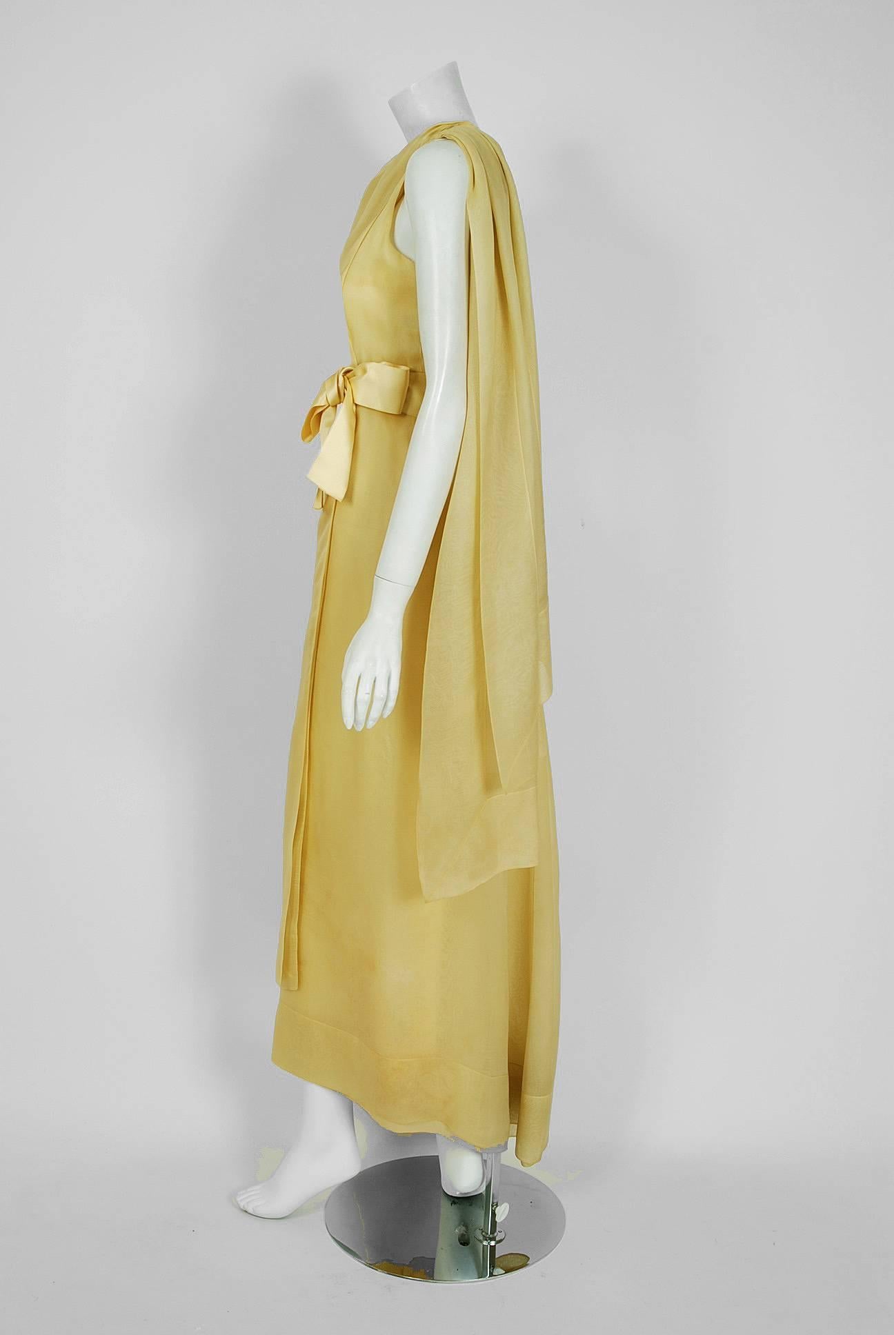 The House of Dior has been an enduring icon of Haute-Couture. When the talented Marc Bohan took over as head designer in 1960, he continued the Dior tradition of elegant design. This beautiful goddess gown, which was featured in L'Officiel Magazine,