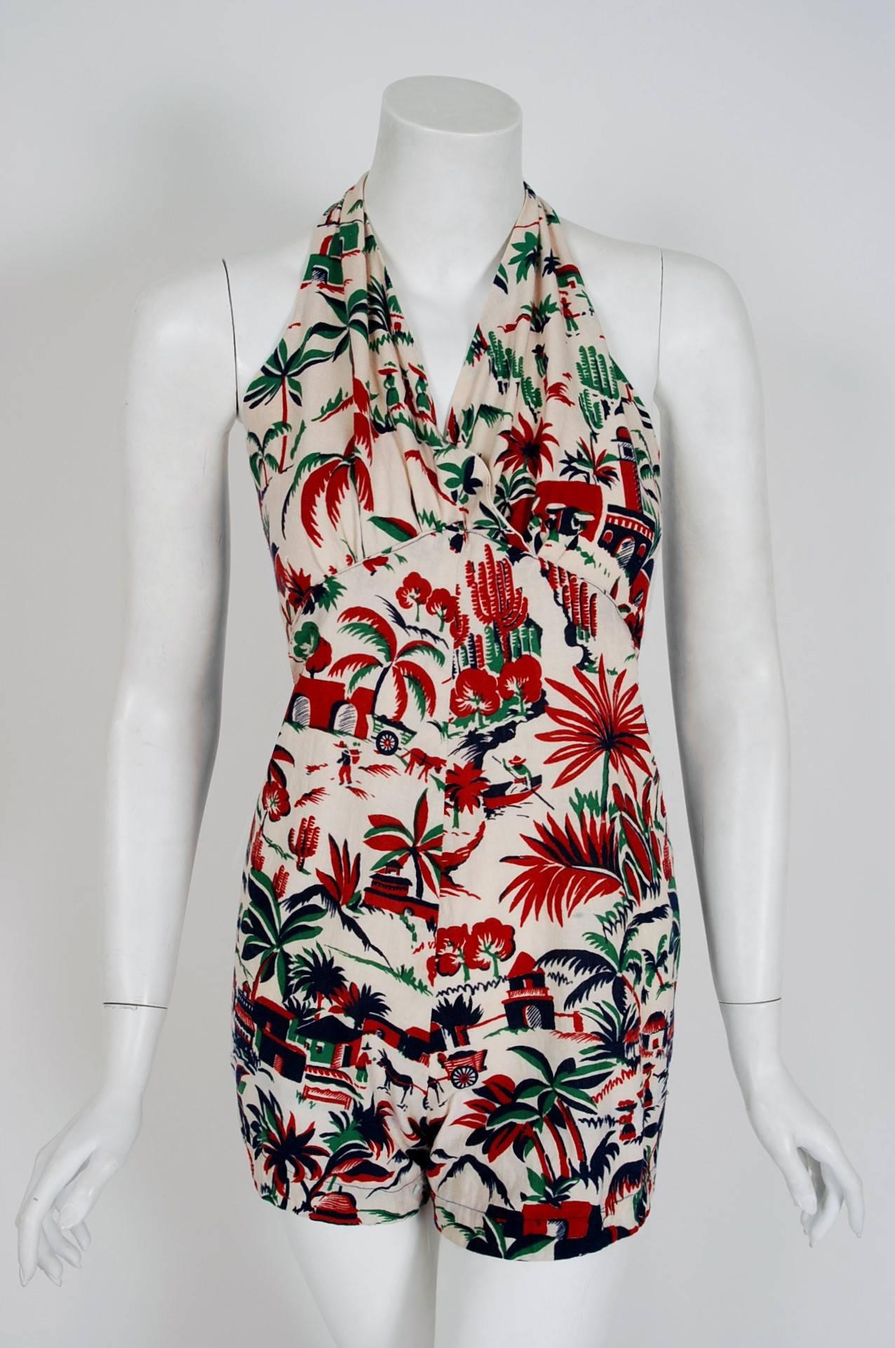 With its colorful Caribbean scenic novelty-print and flawless styling, this playsuit ensemble has the casual elegance the 1940's were known for. The shelf-bust halter bodice is both very flattering and effortless to wear. The hourglass nipped