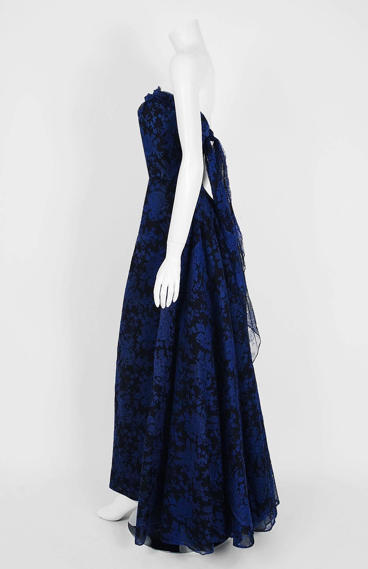 Breathtaking sapphire-blue roses floral chantilly-lace gown created by Italian designer Fernando Sarmi when he was head designer for Elizabeth Arden in the 1950's. Ferdinando Sarmi expressed interest in fashion during his youth but was discouraged