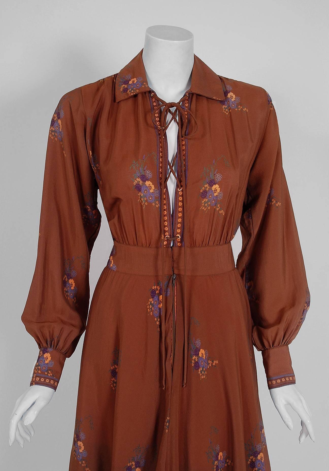 Seductive Ted Lapidus Haute-Couture boutique cinnamon floral print dress from the mid 1970's. After an apprenticeship with Dior, Ted Lapidus started his own fashion house in 1951. In 1963, he created a near scandal in the world of fashion by forming