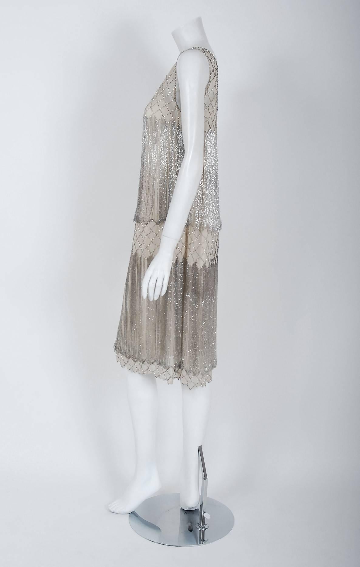 1920's French Couture Beaded Fringe Ivory Silk Chiffon Cut-Out Flapper Dress  In Excellent Condition In Beverly Hills, CA