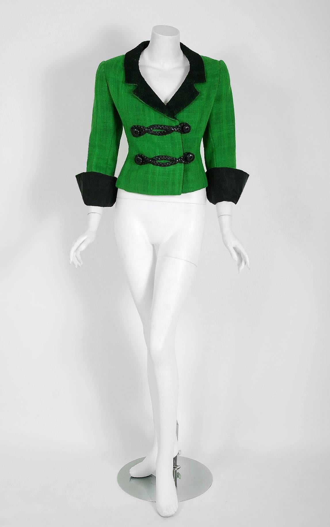 The House of Dior has been an enduring icon of Haute Couture. When the talented Marc Bohan took over as head designer in 1960, he continued the Dior tradition of elegant design. This gorgeous green and black documented jacket from his 1964