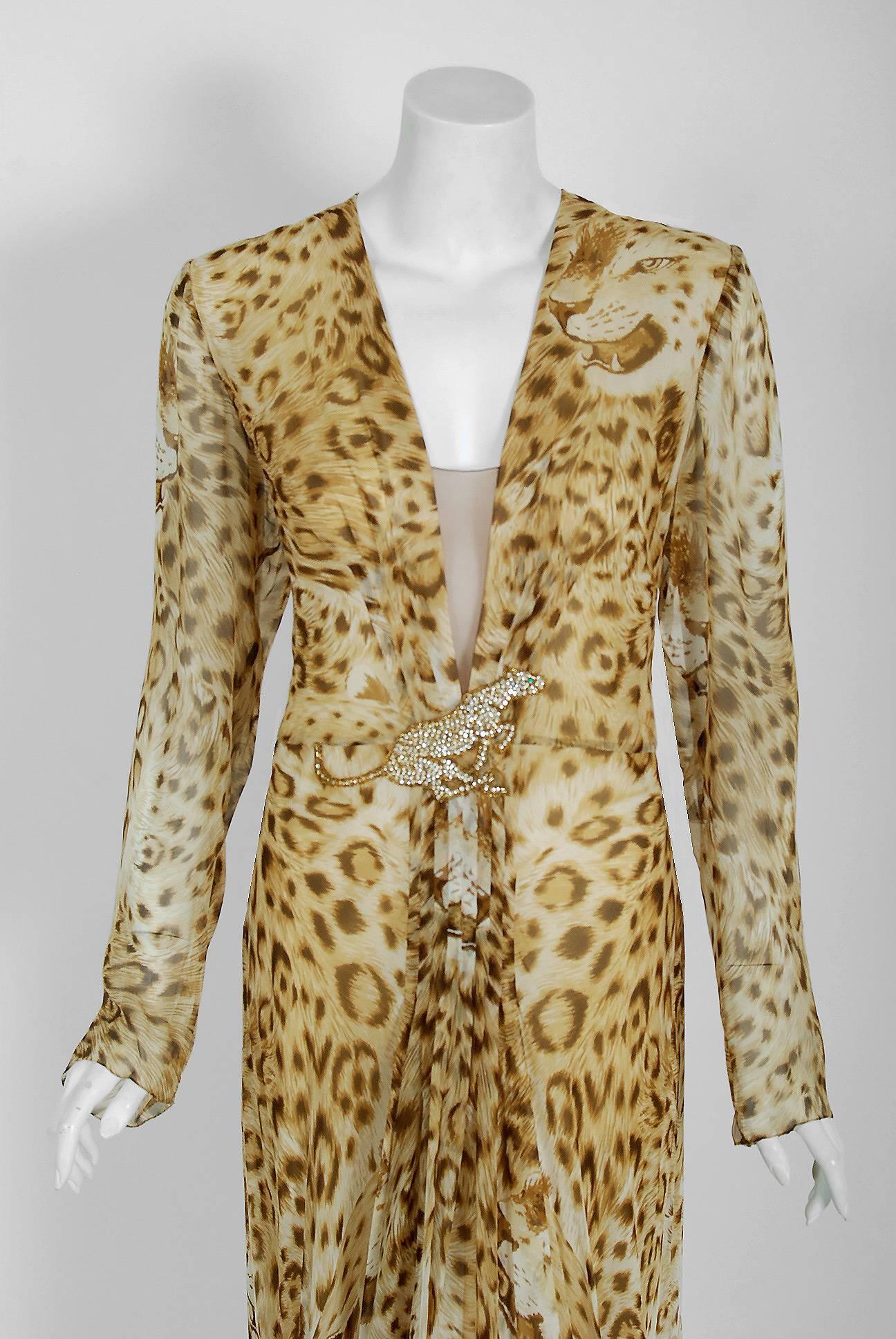 Breathtaking 1977 museum quality leopard print silk-chiffon dress by Hanae Mori. Whilst on a Paris holiday in 1960, Mori had a fateful fitting with Coco Chanel. She claimed this meeting changed her life and she challenged herself to realize her own