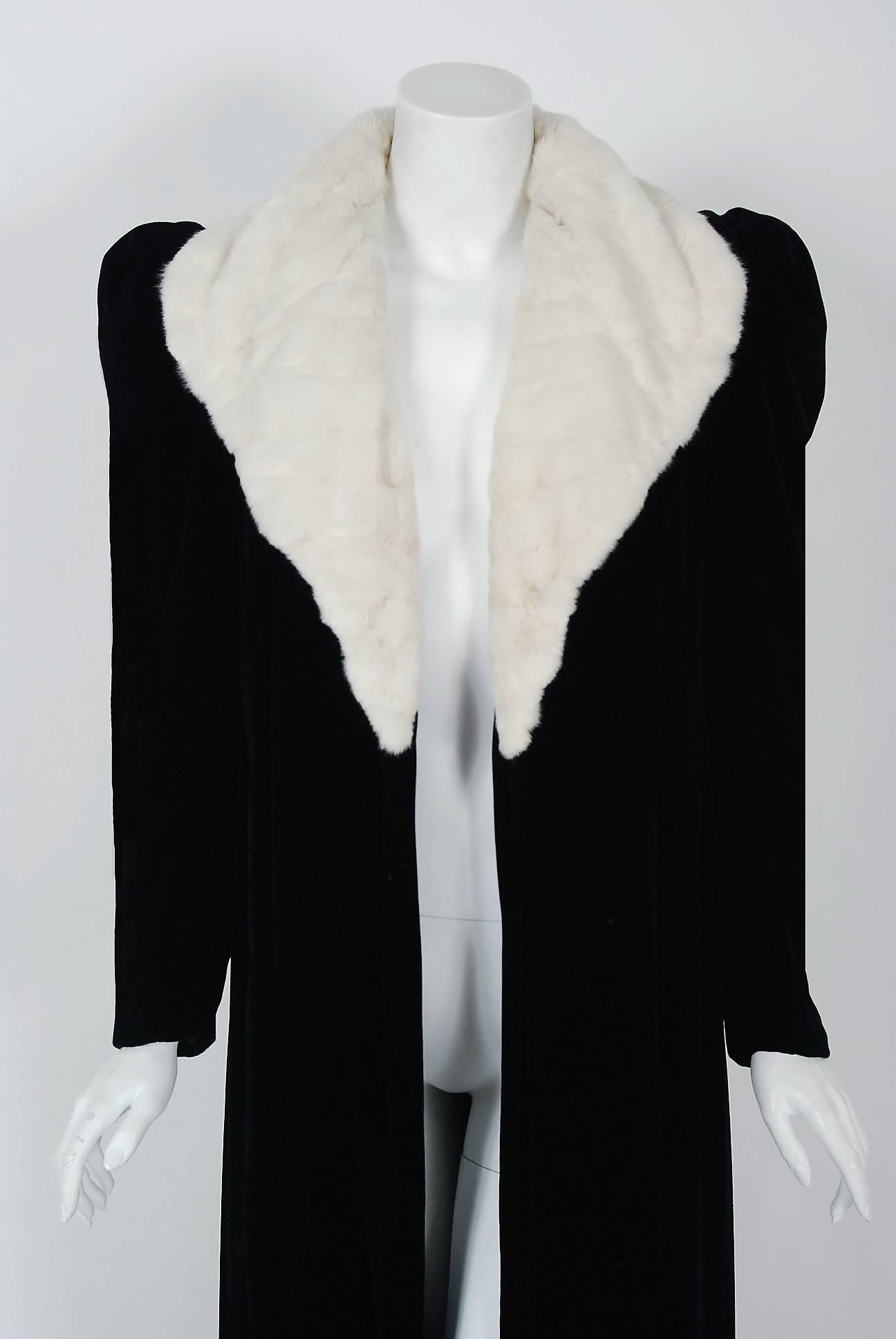 This exquisite late 1930's I.Magnin Import Couture ermine-fur and silk-velvet coat will make any woman shine during cold winter months. The soft white fur has been worked into a deco stripe pattern and the effect is really breathtaking. The care to