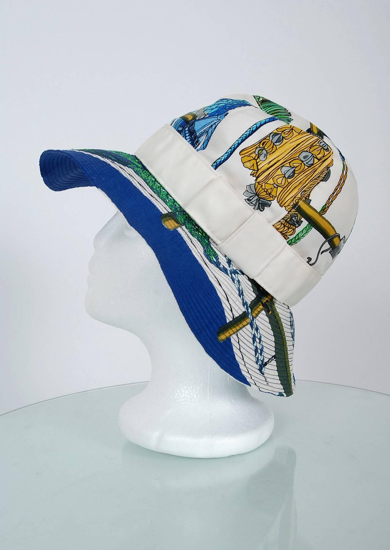 Hermès Paris has whispered the ultimate in luxury since 1837. This beautiful resort bucket hat, dating back to the mid 1960's, is a perfect example of this brand's elegant allure. The fabric used for this hat is breathtaking; colorful nautical