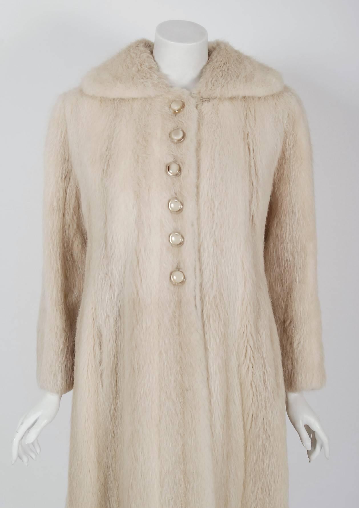 This exquisite Pierre Cardin Couture genuine mink-fur stroller, dating back to his 1964 collection, will make any woman shine during cold winter months. The soft blonde mink been worked into vertical panels and the effect is really breathtaking. The