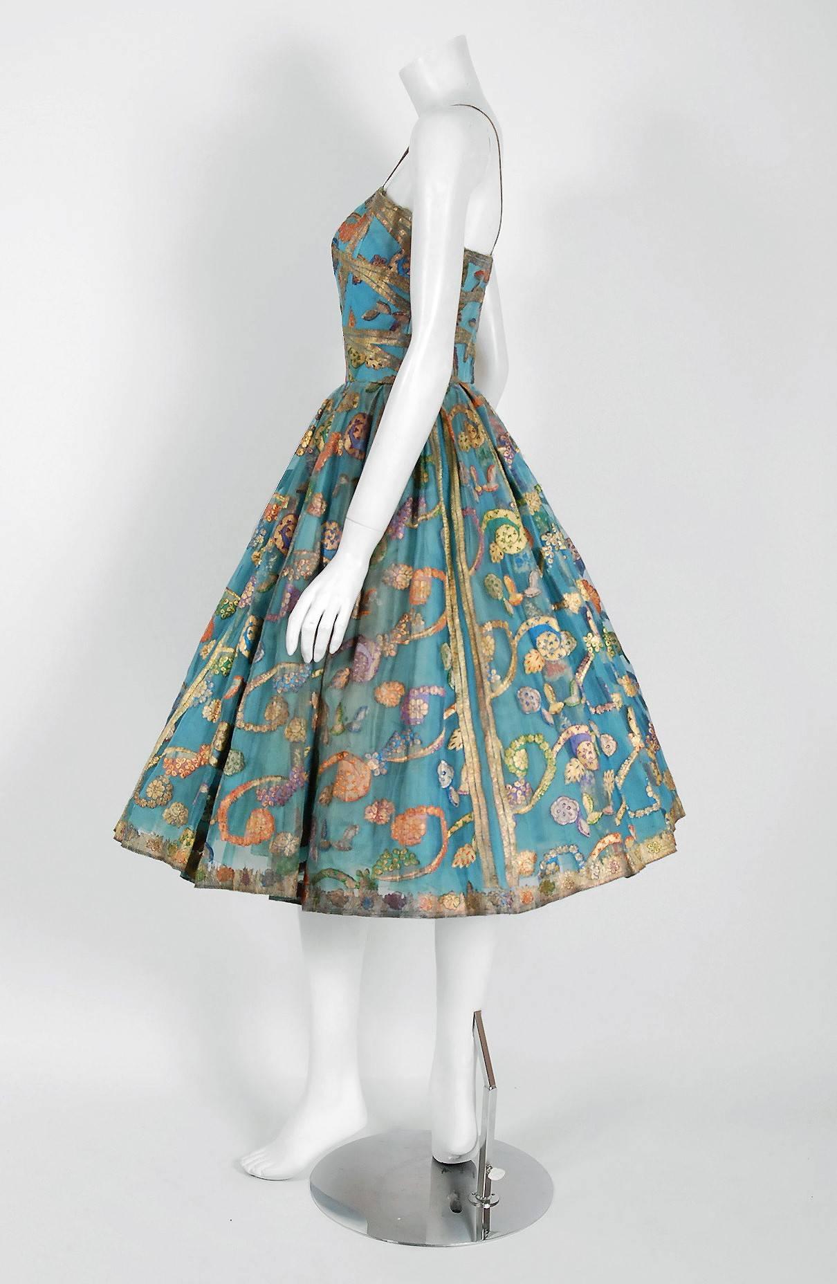 Breathtaking 1950's cocktail party dress by the highly adored label "Sophie of Saks Fifth Avenue". Sophie Gimbel was a leading designer for nearly 40 years and an innovator of the "New Look"; that gained popularity after World