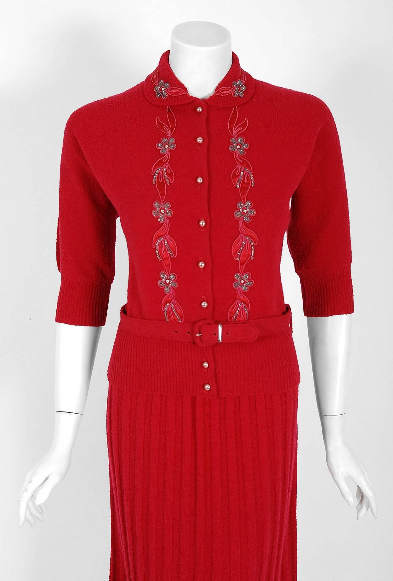 An alluring Koldin Originals cranberry-red chenille knit wool ensemble from the "Old Hollywood" era of glamour. The sweater has beautiful pearlized buttons, novelty leaf satin-appliques and beaded floral detail  I love the hourglass belted