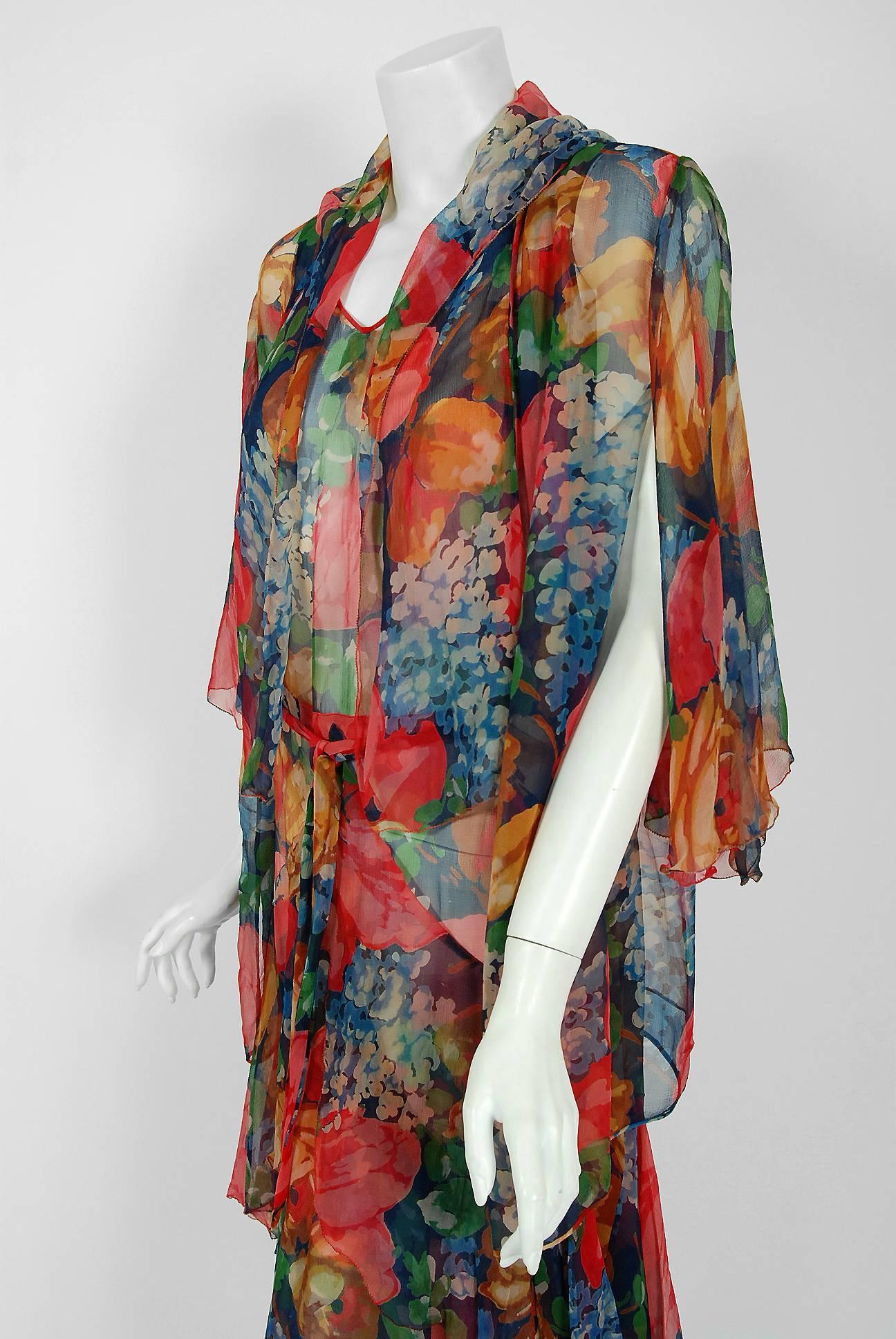 The breathtaking watercolor floral rose-garden print used in this late 1920's silk-chiffon flapper ensemble has a fresh innocence that I find irresistible. The bodice has an elegant sleeveless plunge with smocked shoulders. The matching jacket has