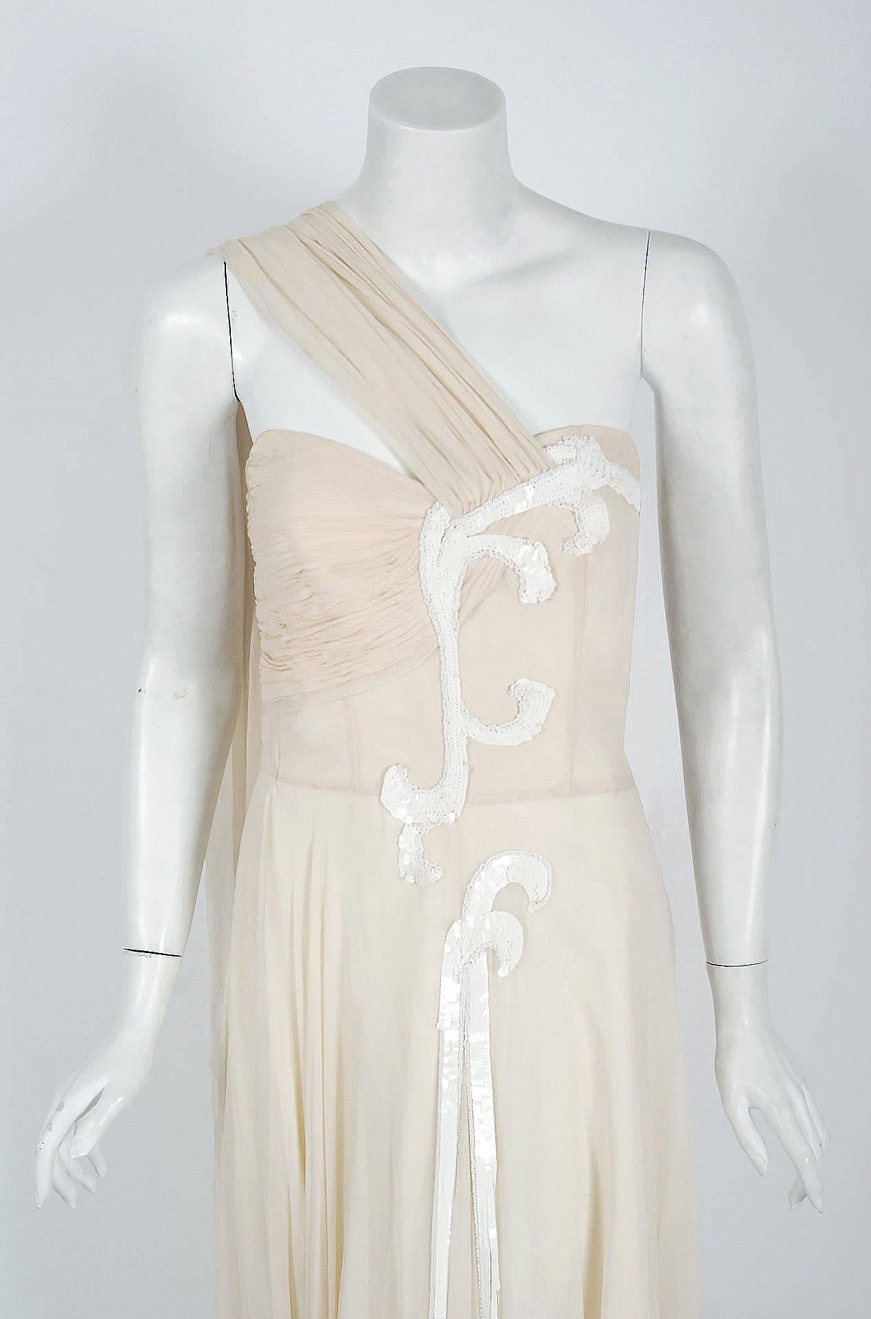 Ethereal late 1940's Saks Fifth Avenue creme goddess gown from the Old Hollywood era of glamour. This stunning silk-chiffon garment has so much couture detail, you can tell it was made with expert devotion. The boned sweetheart plunge bodice is